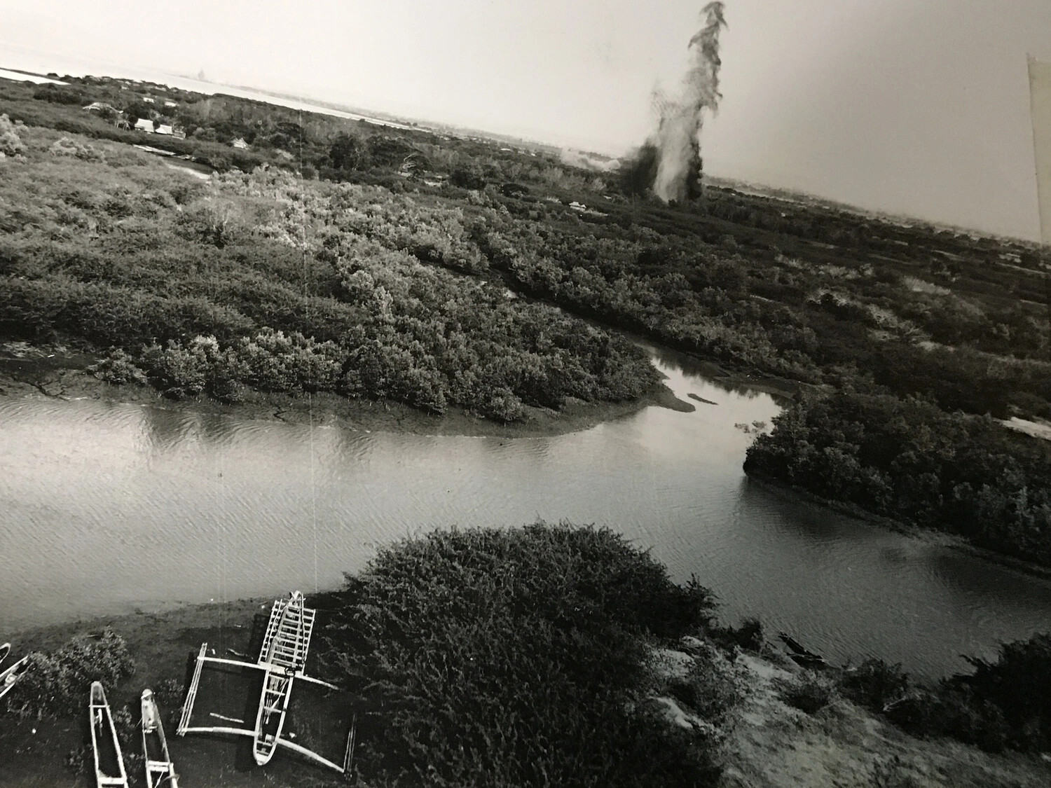 Aerial Strike Photograph — River and Coastal Target with Smoke Plume, 312th Bomb Group, Pacific Theater, WWII