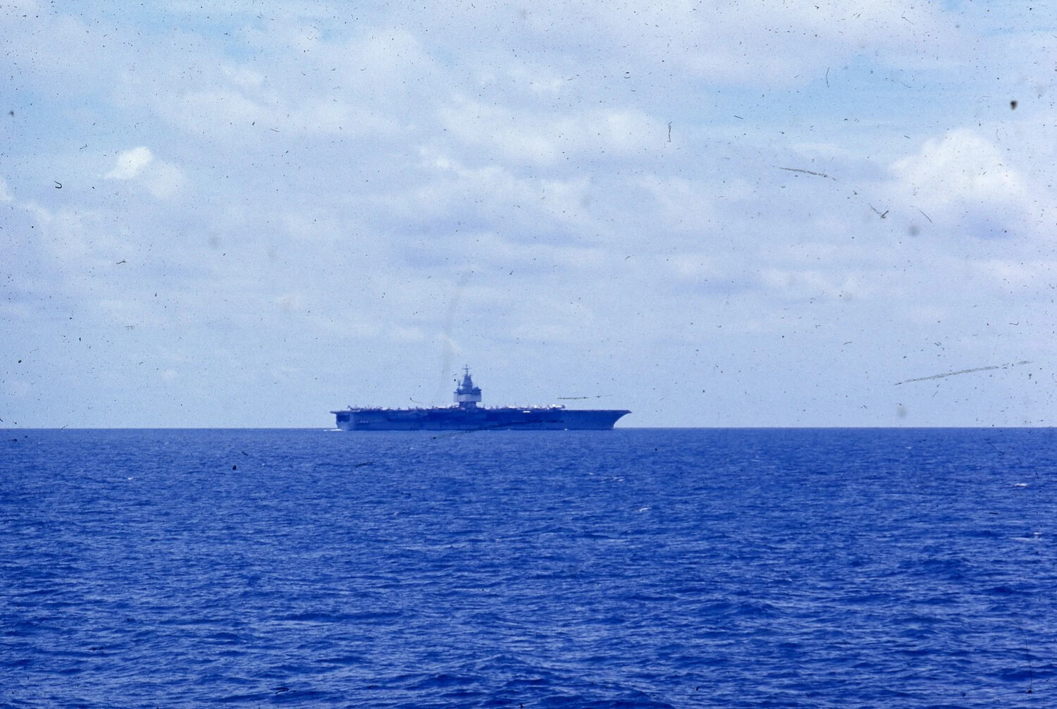 Distant View of USS Ticonderoga Underway at Sea, Vietnam War Era