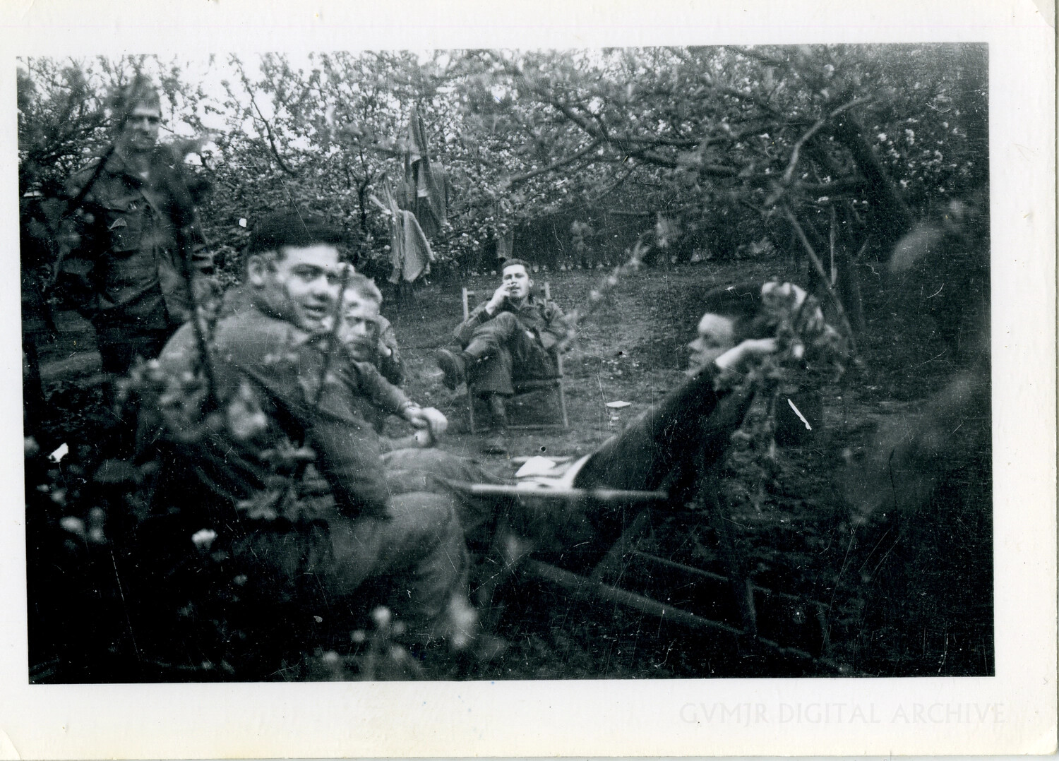 Airborne Troopers at Rest in an Orchard Bivouac