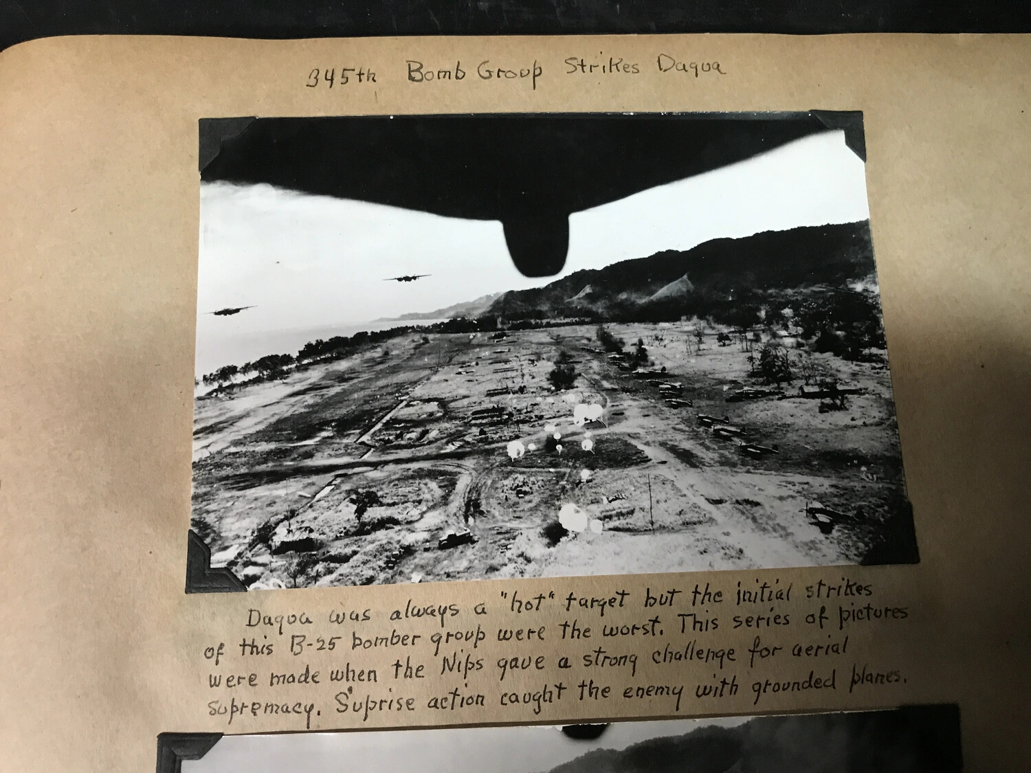 Scrapbook Page: '345th Bomb Group Strikes Dagua' -- Annotated New Guinea Airfield Raid Photograph