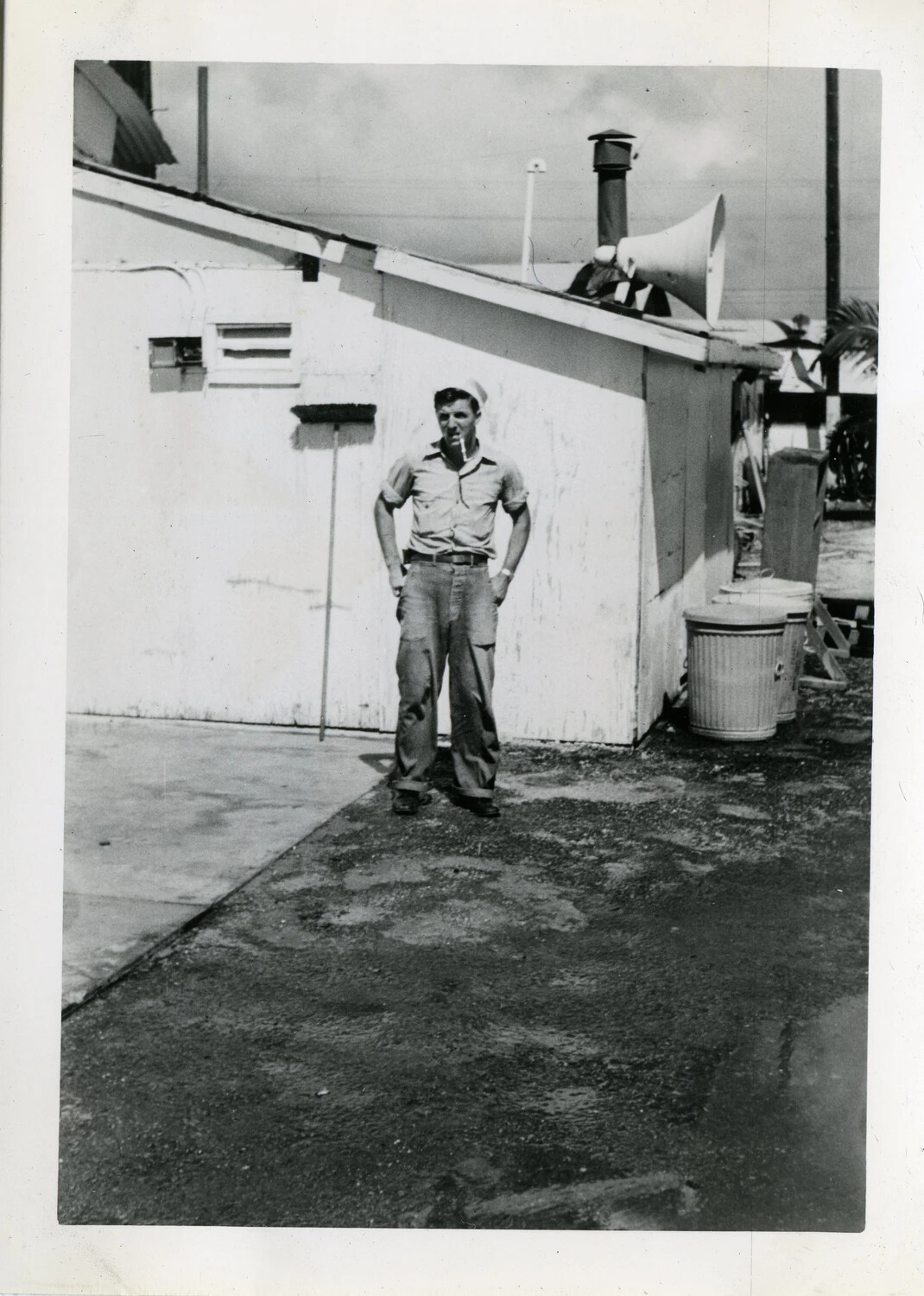 Sailor Outside Barracks Building with PA Loudspeaker, NAS Agana, Guam, VR-6 Squadron Album