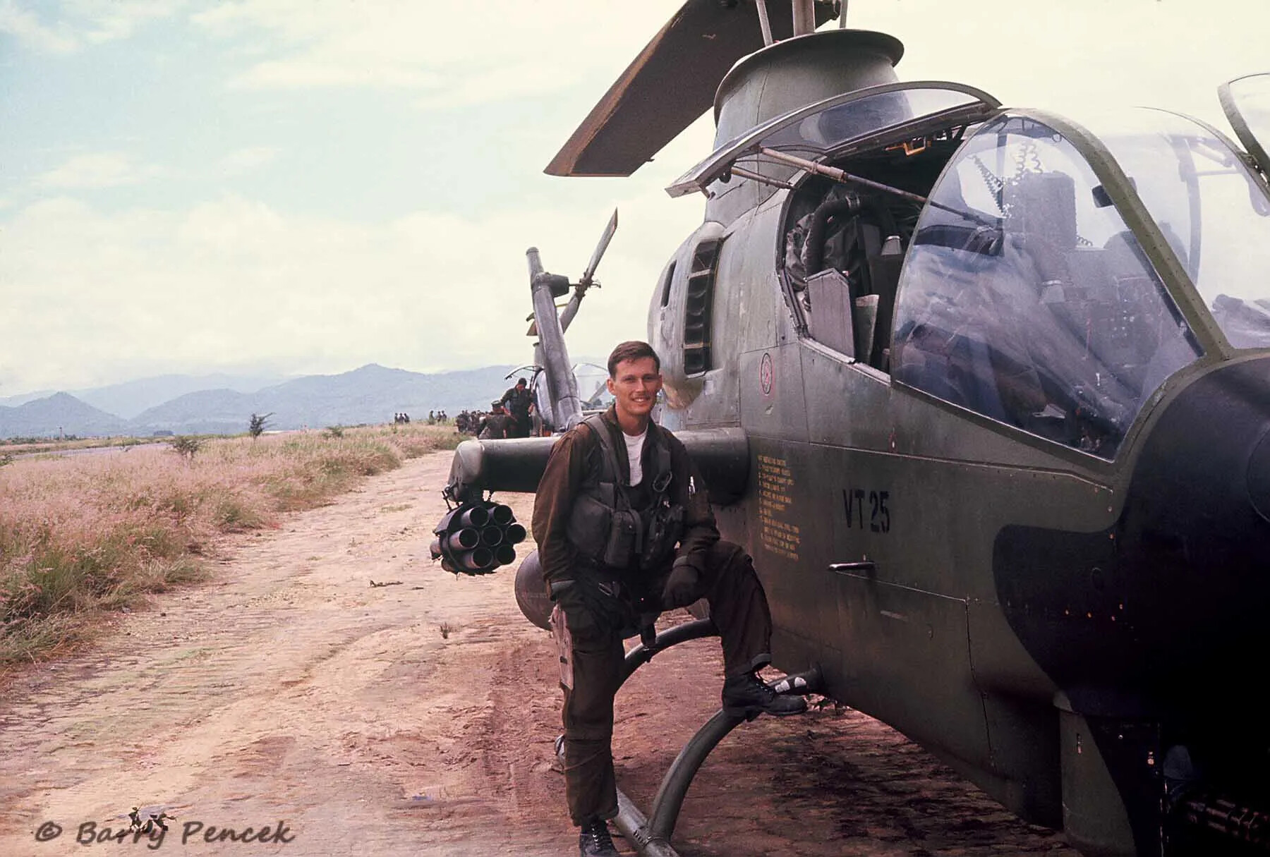 U.S. Army AH-1 Cobra Pilot Poses with Gunship, Tail Code VT 25 - Barry Pencek Collection, Operation Tailwind Era