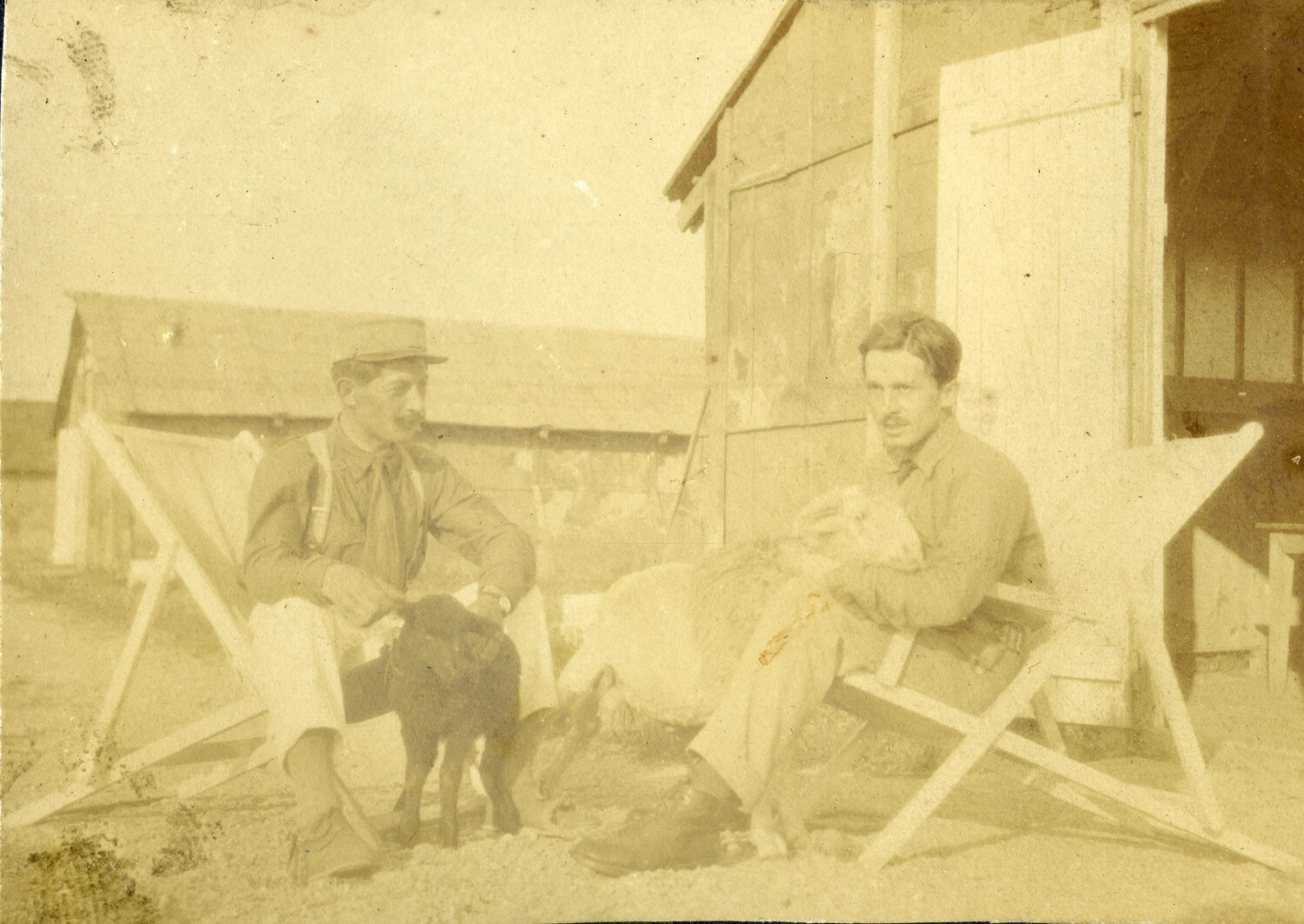 Two Airmen with Pet Lambs Outside a Squadron Hut, WWI French Aerodrome