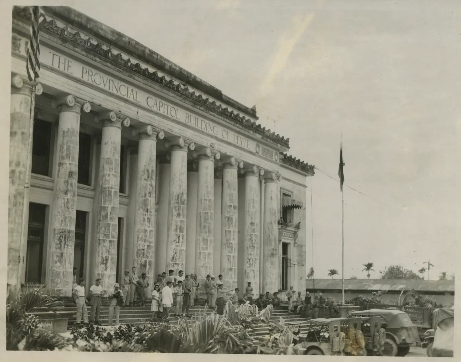The Provincial Capitol Building of Leyte, Tacloban, Philippines — WWII US Servicemen Gathered on the Steps, 312th Bomb Group Collection