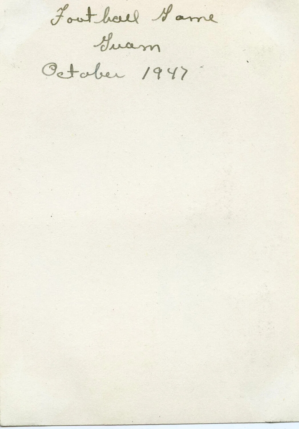 Album Page with Handwritten Caption 'Football Game, Guam, October 1947'
