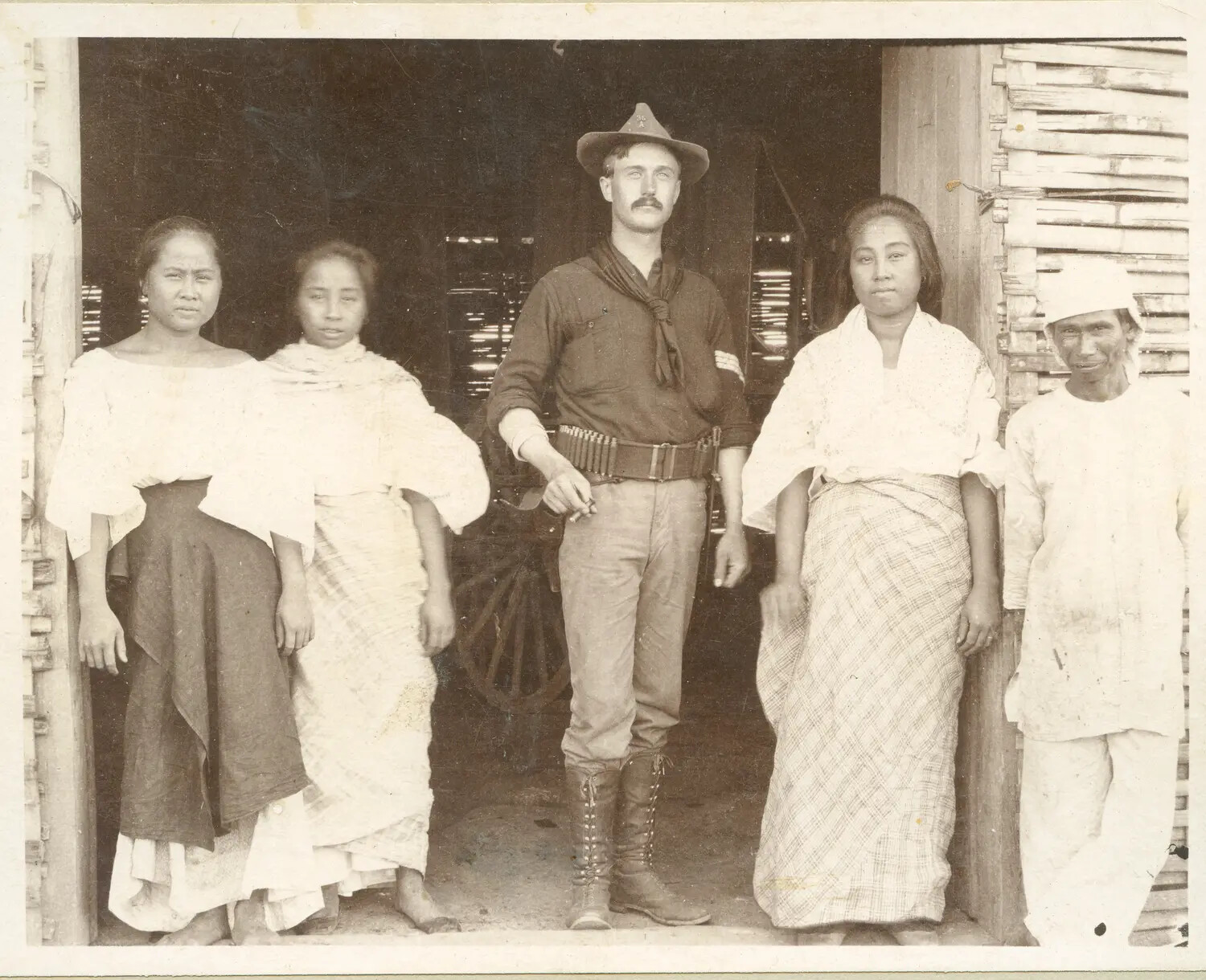 American Army Soldier Posed with Filipino Civilians in Doorway, Philippine-American War Era