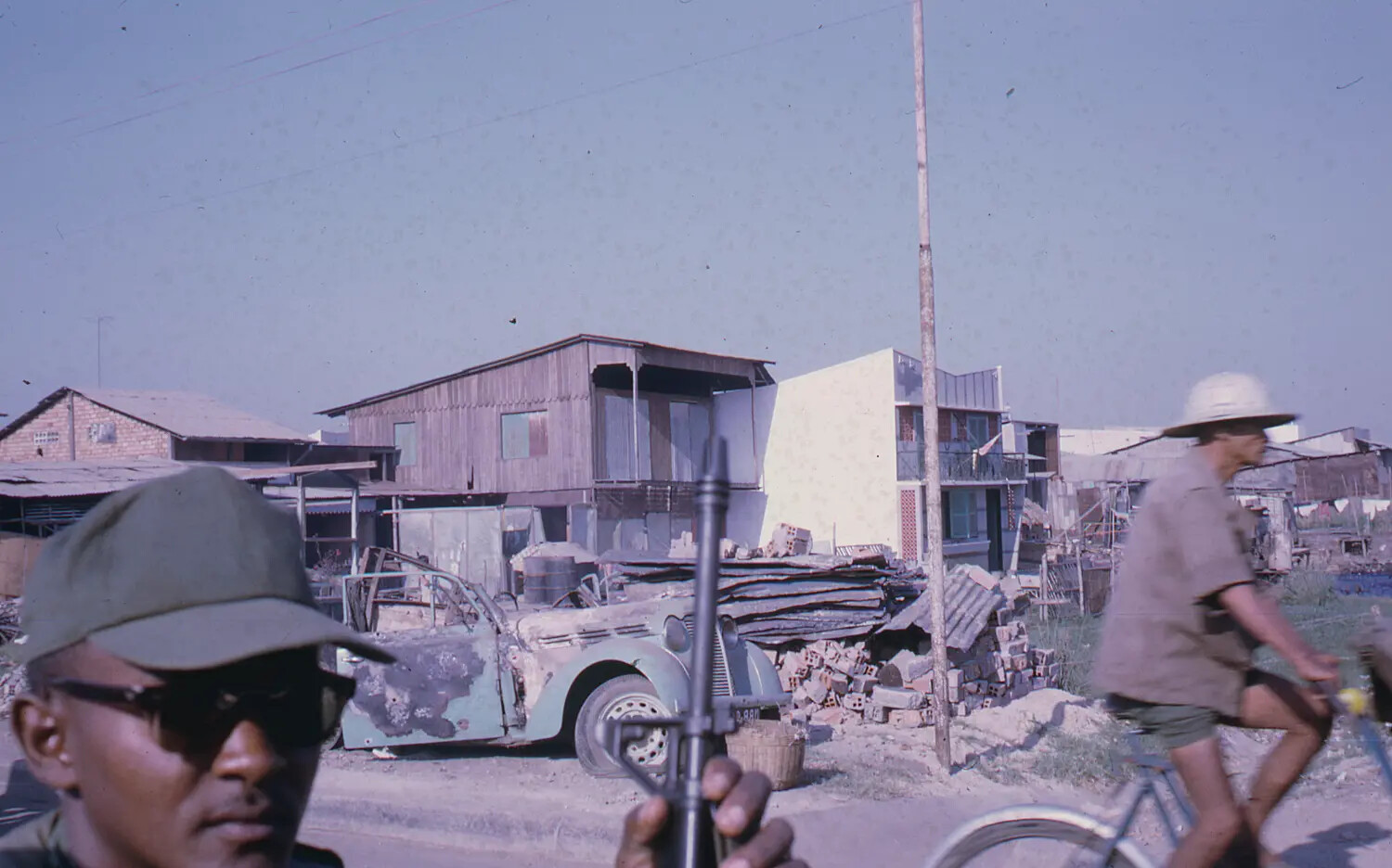 ARVN Soldier Amid War-Damaged Street Scene During the 1968 Tet Offensive, Vietnam