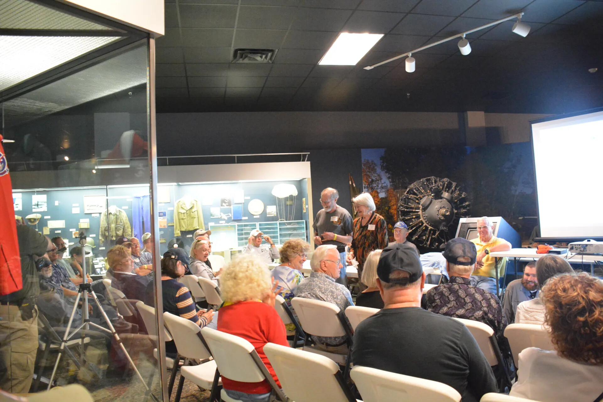 Reunion Gathering with Foreground Uniformed Figure, Tennessee Museum of Aviation