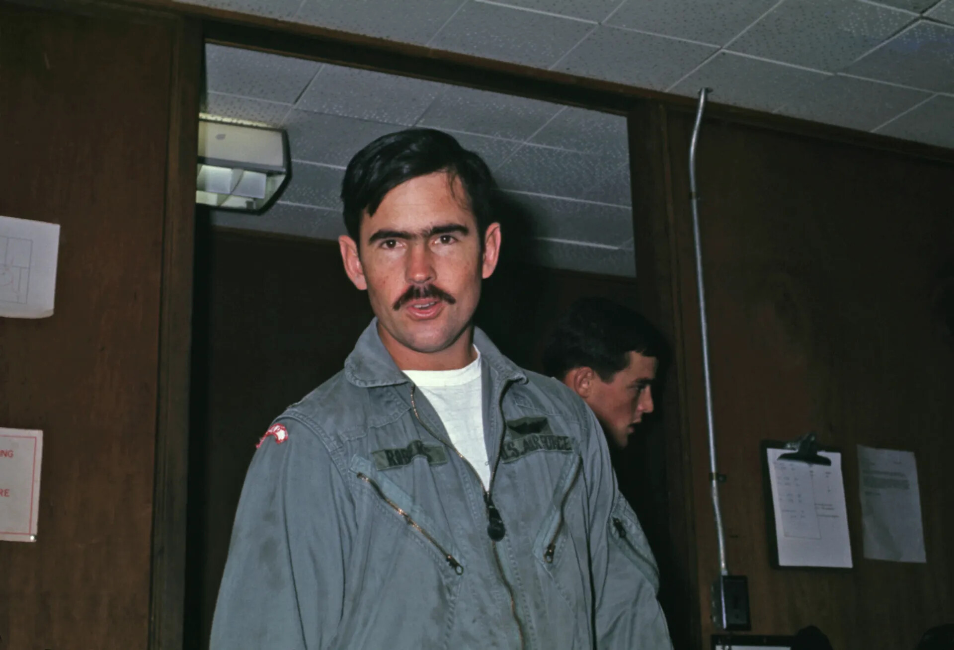 USAF Pilot in Flight Suit, Squadron Building Interior
