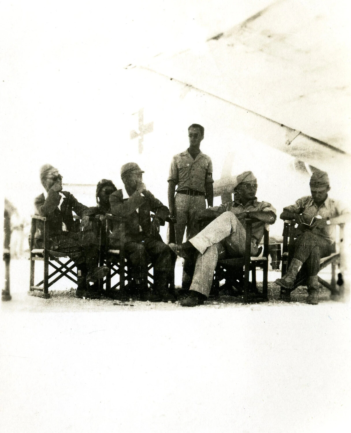 Airmen of the 345th Bombardment Group Relaxing Beneath Aircraft Wing, Ie Shima, WWII Pacific Theater