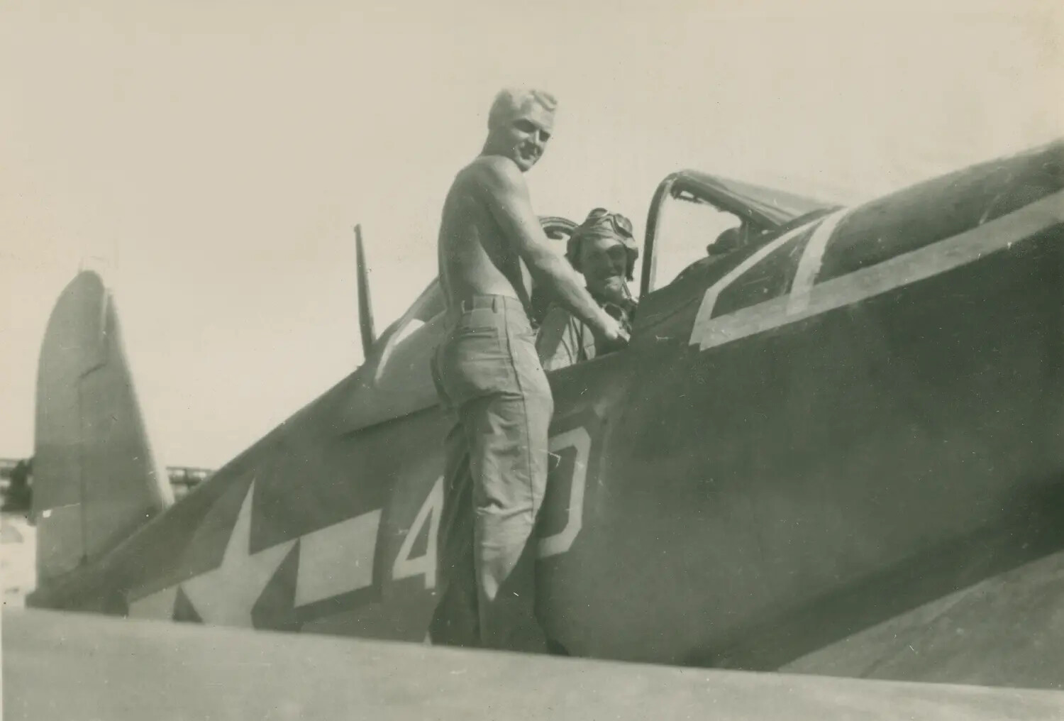 Pilot and Crewman Beside WWII Fighter Aircraft, McAleer Photo Album