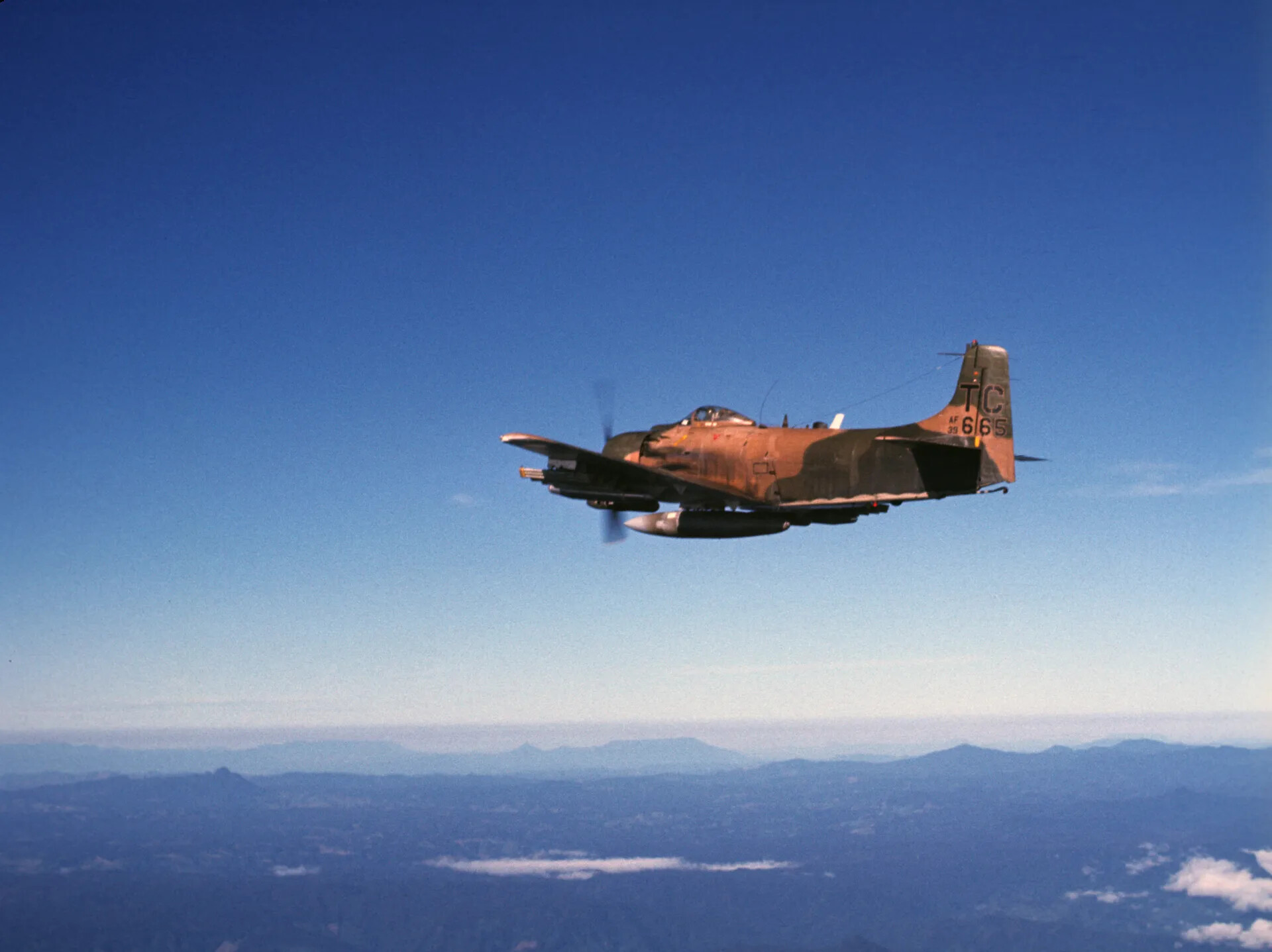 A-1 Skyraider 'TC 665' Banking at Altitude Over Vietnam Highlands, circa 1970, Don Engebretsen Collection