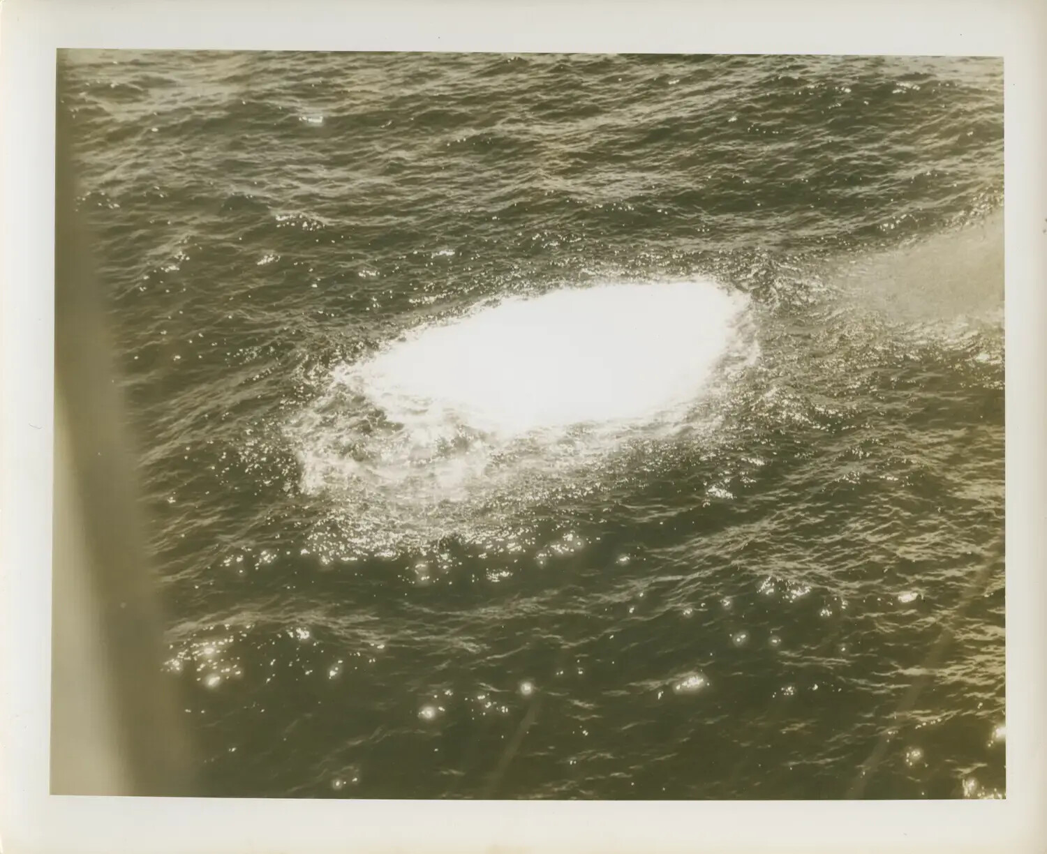 Splash on Ocean Surface Viewed from Shipboard, USS Petrof Bay (CVE-80), WWII
