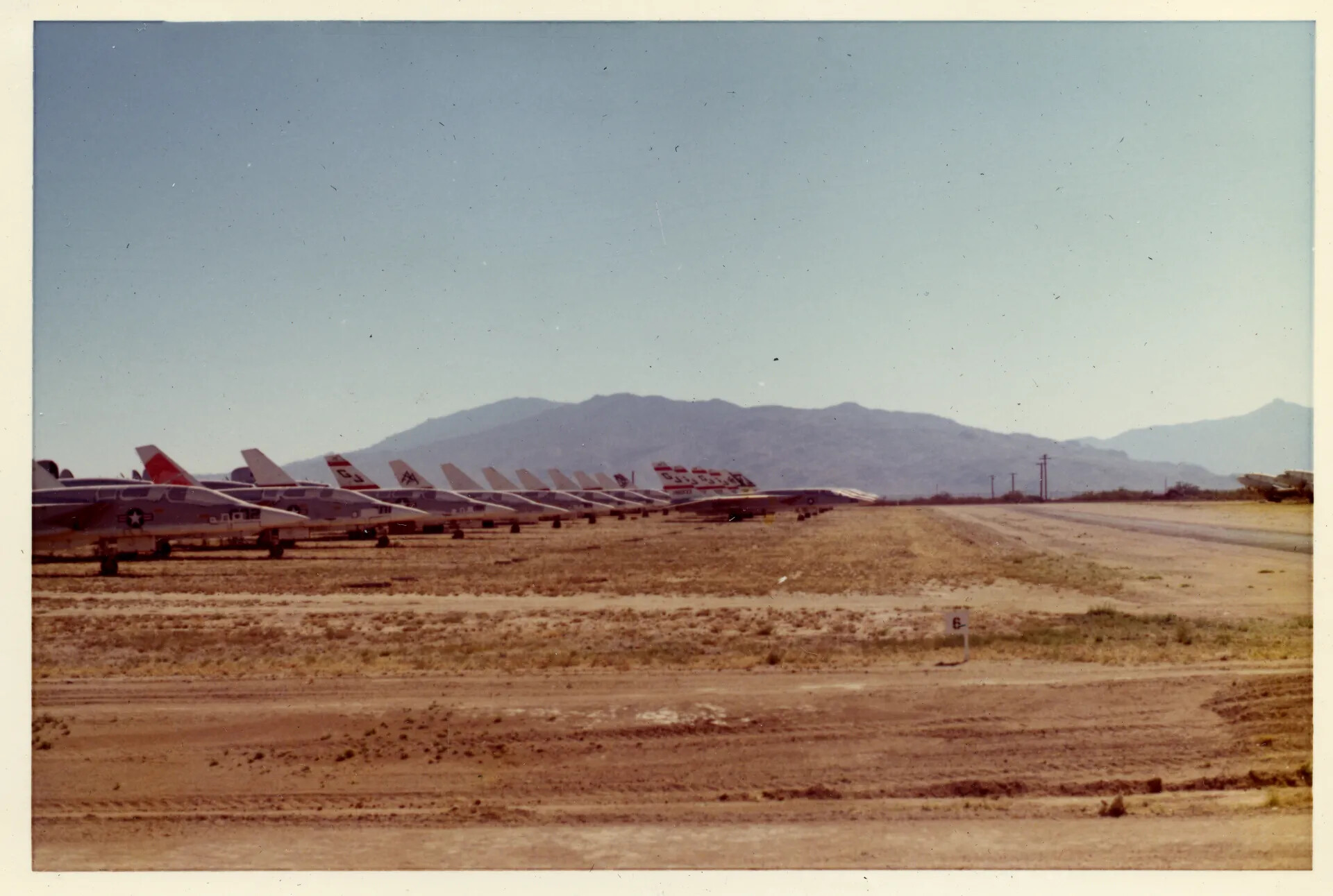 Row of Retired Jet Aircraft in Desert Storage Yard (Aircraft Boneyard), Vietnam-Era Types