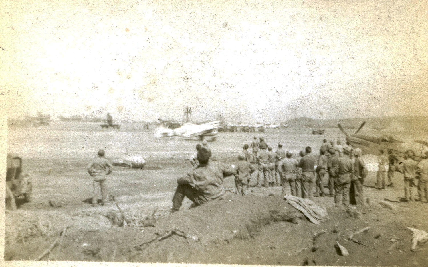 Marines Watch Fighter Aircraft on Airstrip, Iwo Jima, 1945