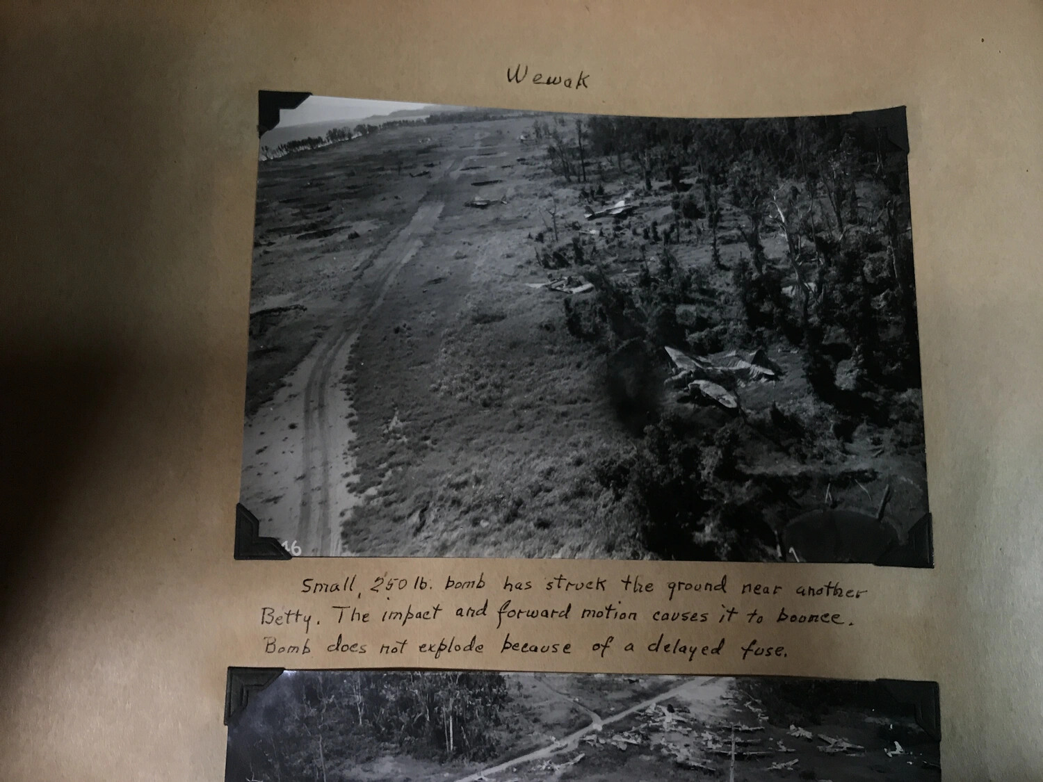 Album Page: 'Wewak' - Bombing Strike Photo with Handwritten Technical Caption
