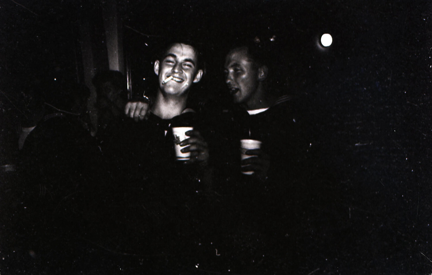 Sailors Sharing a Drink at an Informal Gathering, USS Yorktown, 1953