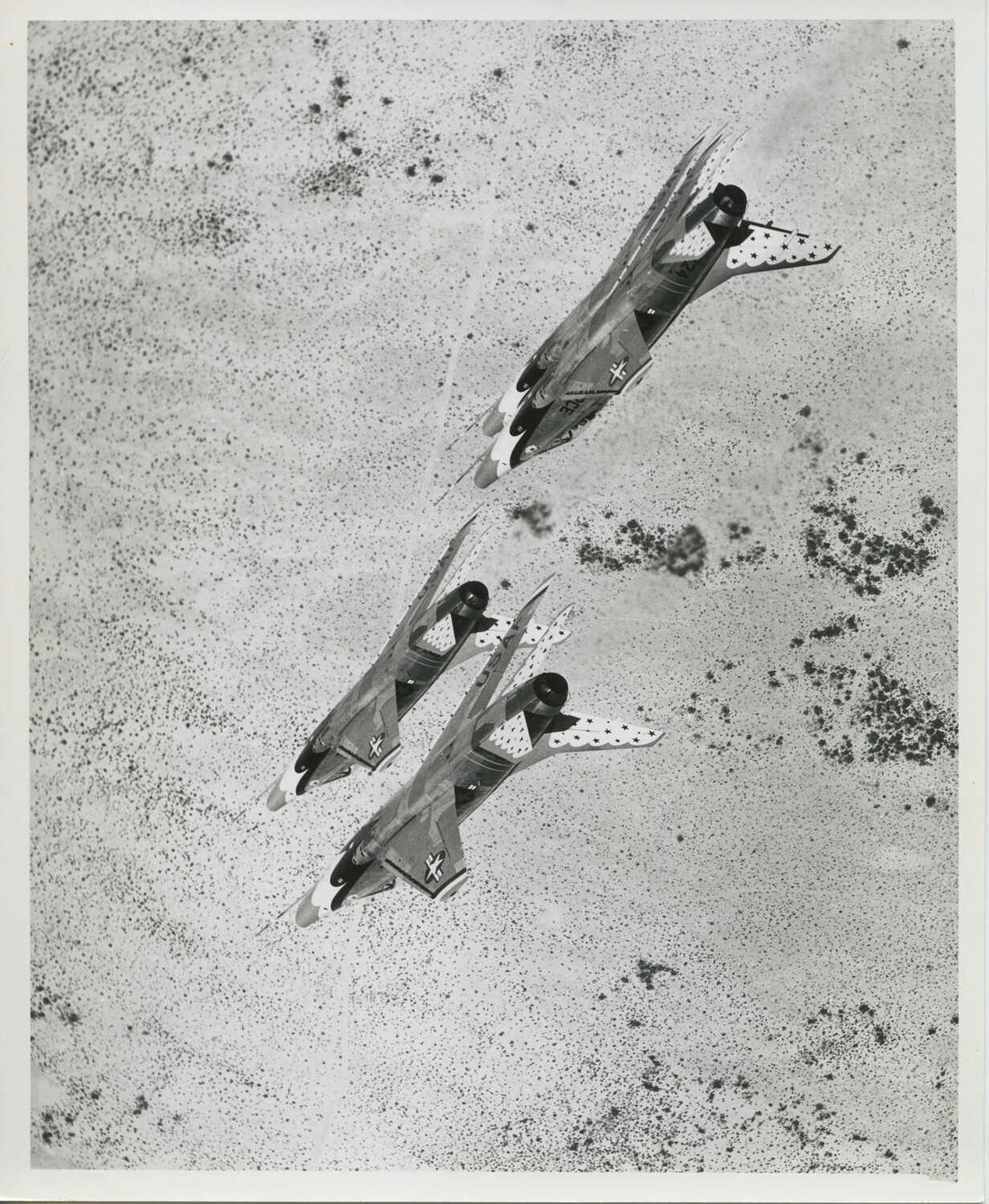 Overhead View of Three F-100 Super Sabres in Tight Echelon Formation
