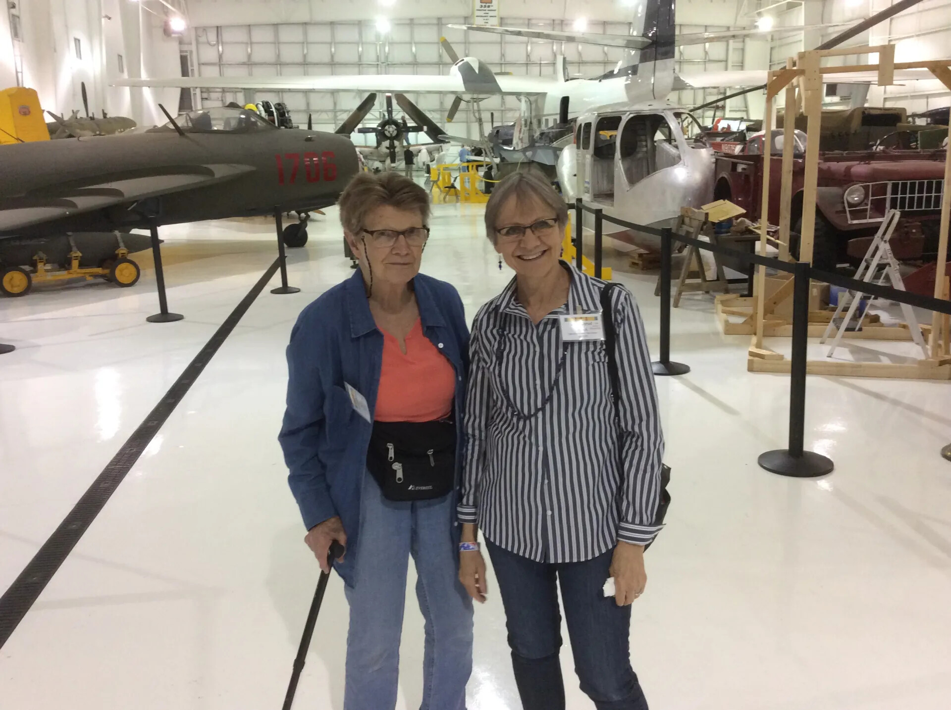 Two Women Posing at Aircraft Restoration Museum, Operation Tailwind Reunion Event