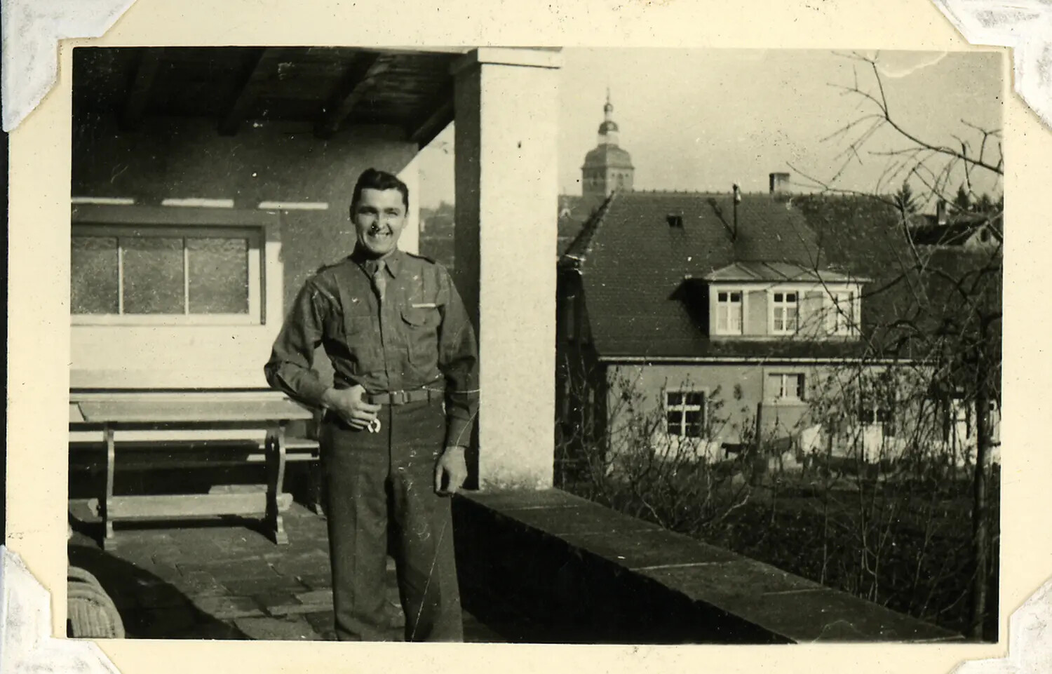Smiling U.S. Serviceman on a Terrace Overlooking a European Town, WWII/Post-War Era