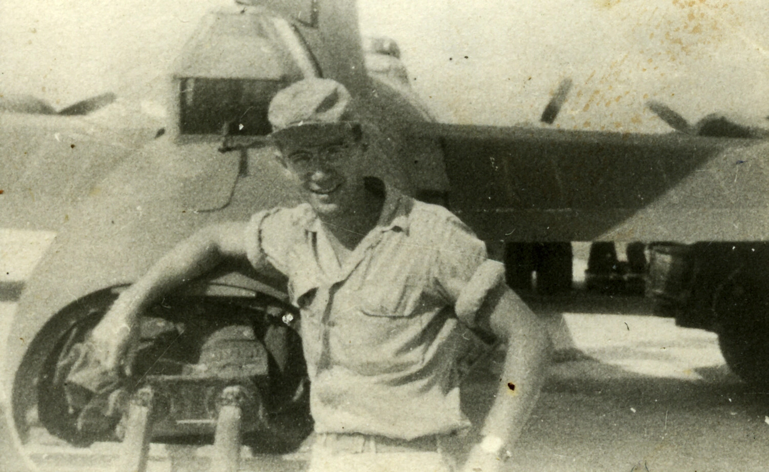 American Airman Posing Beside Aircraft Landing Gear – WWII Okinawa, 1945