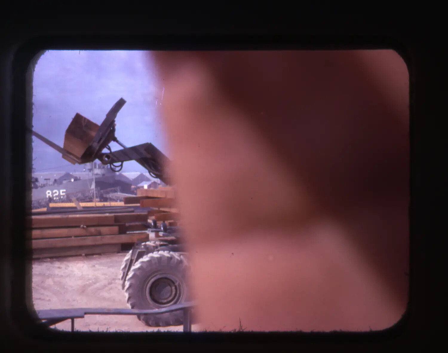 Photograph of Stereo Slide Viewer Showing Supply Yard Scene, Likely Cam Ranh Bay, Vietnam