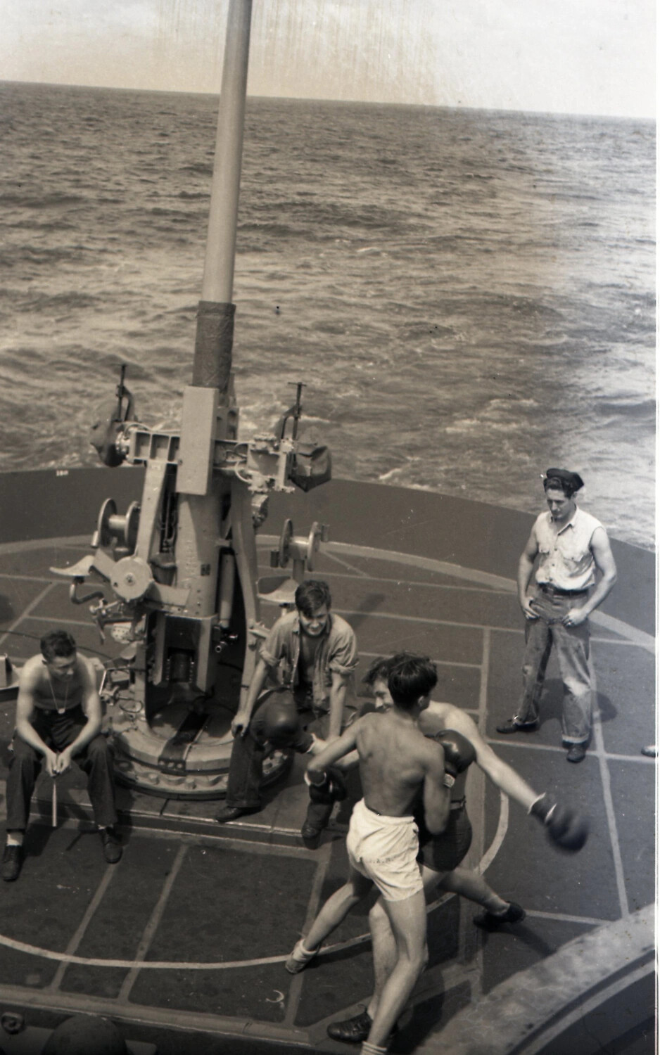 U.S. Navy Sailors Boxing on Deck Beside Anti-Aircraft Gun Mount, WWII Era