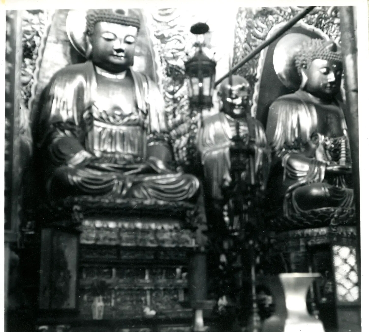 Interior View of Buddhist Temple with Gilded Buddha Statues, China-Burma Theater, WWII Era