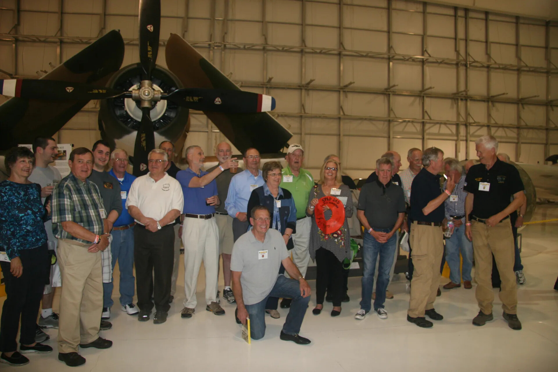 Group Reunion Photo Beneath A-1 Skyraider Aircraft, 'SPAD DAD' Keepsake Displayed