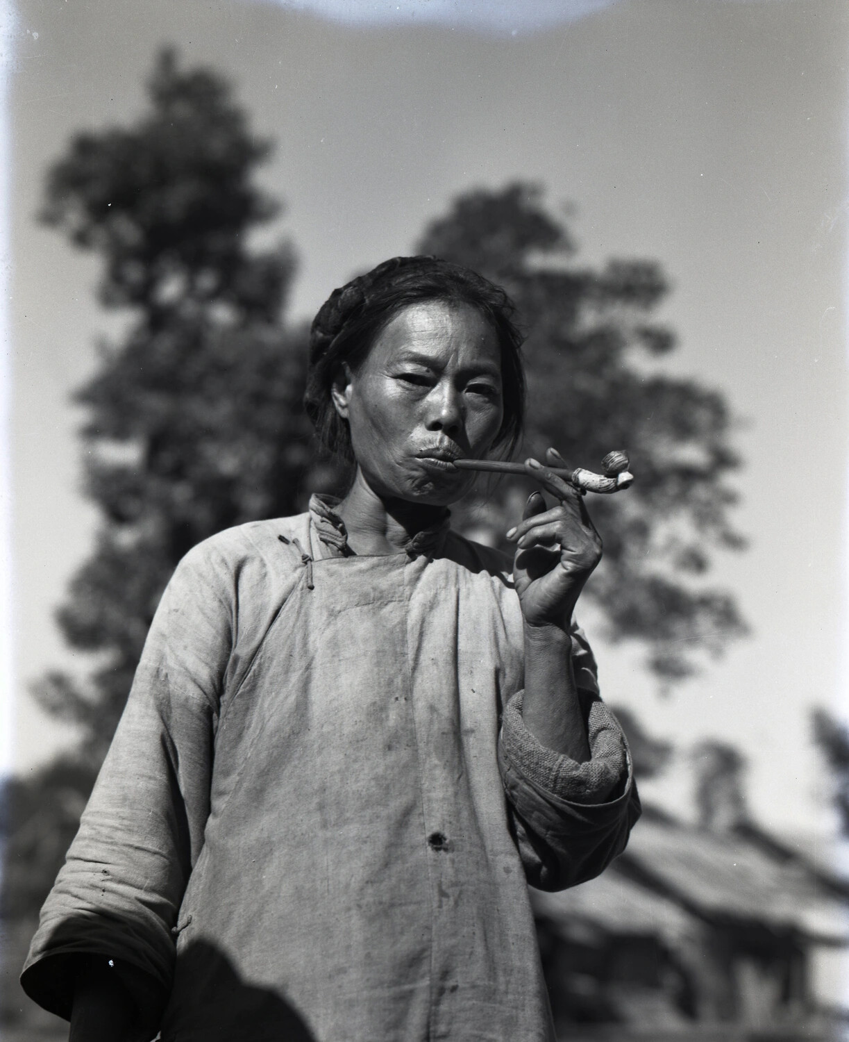 Portrait of an Elderly Woman Smoking a Pipe, Burma-India Theater, 1944-45
