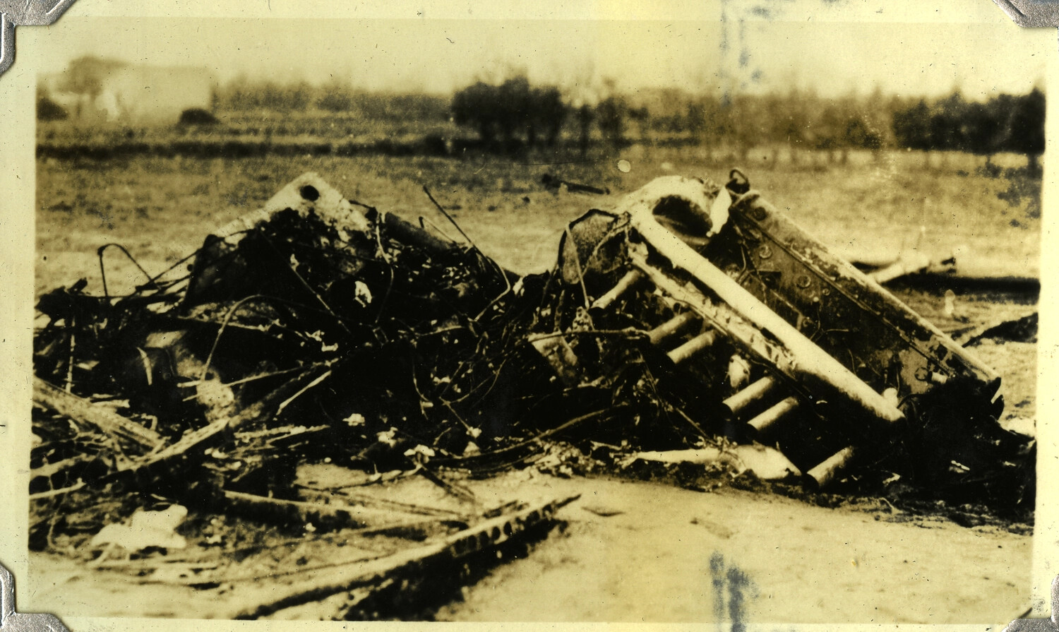 Wreckage of a Crashed and Burned Aircraft in an Open Field, c. 1930s
