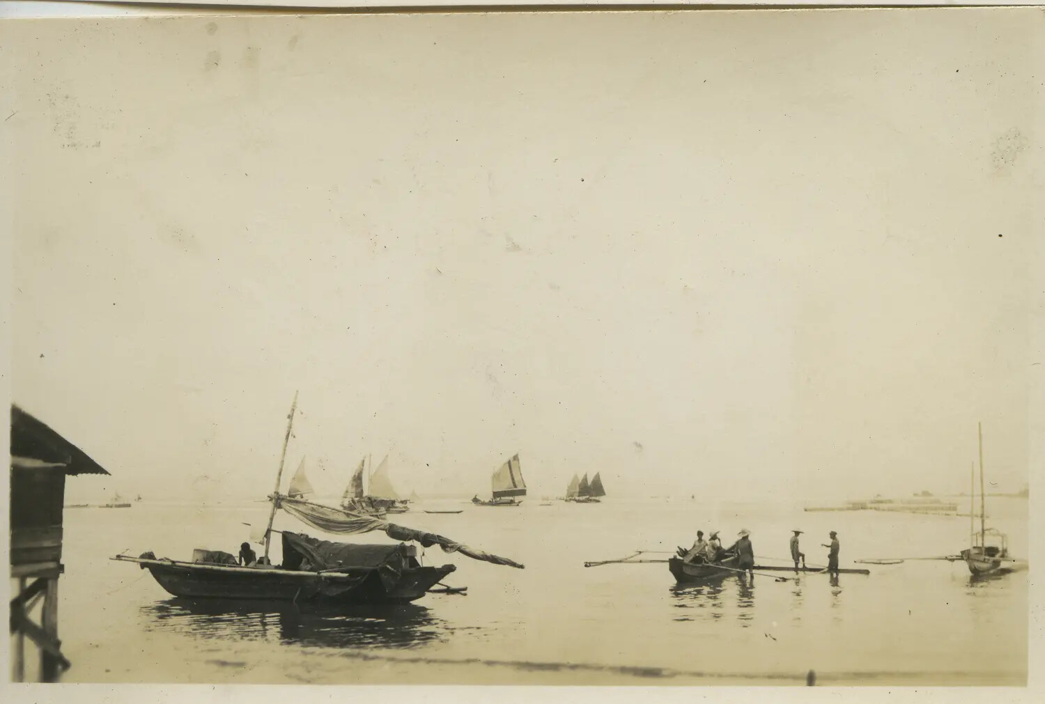 Native Outrigger Sailboats and Fishermen in Pacific Harbor Scene