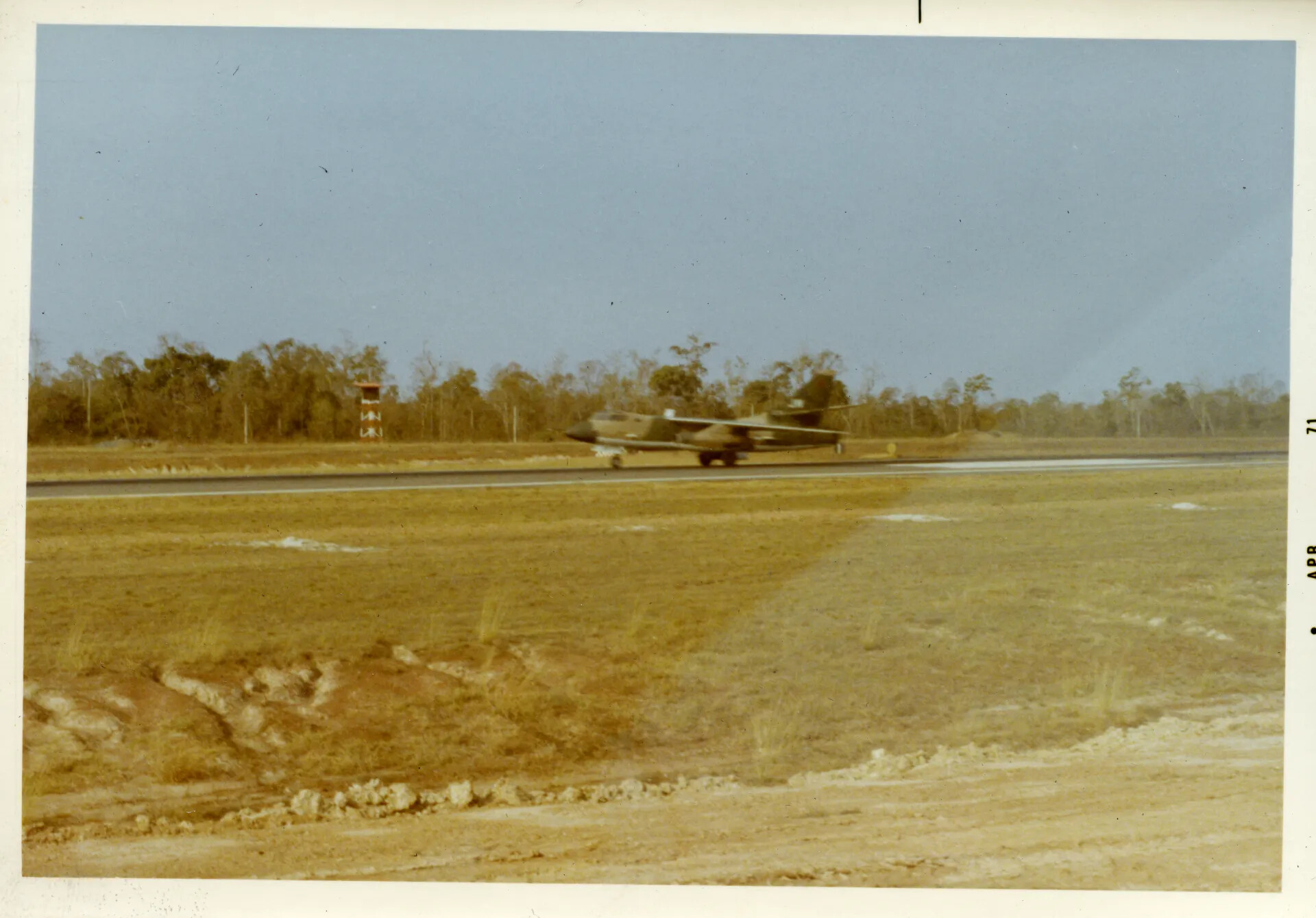 Camouflaged Twin-Engine Jet on Runway, Nakhon Phanom Air Base, April 1971
