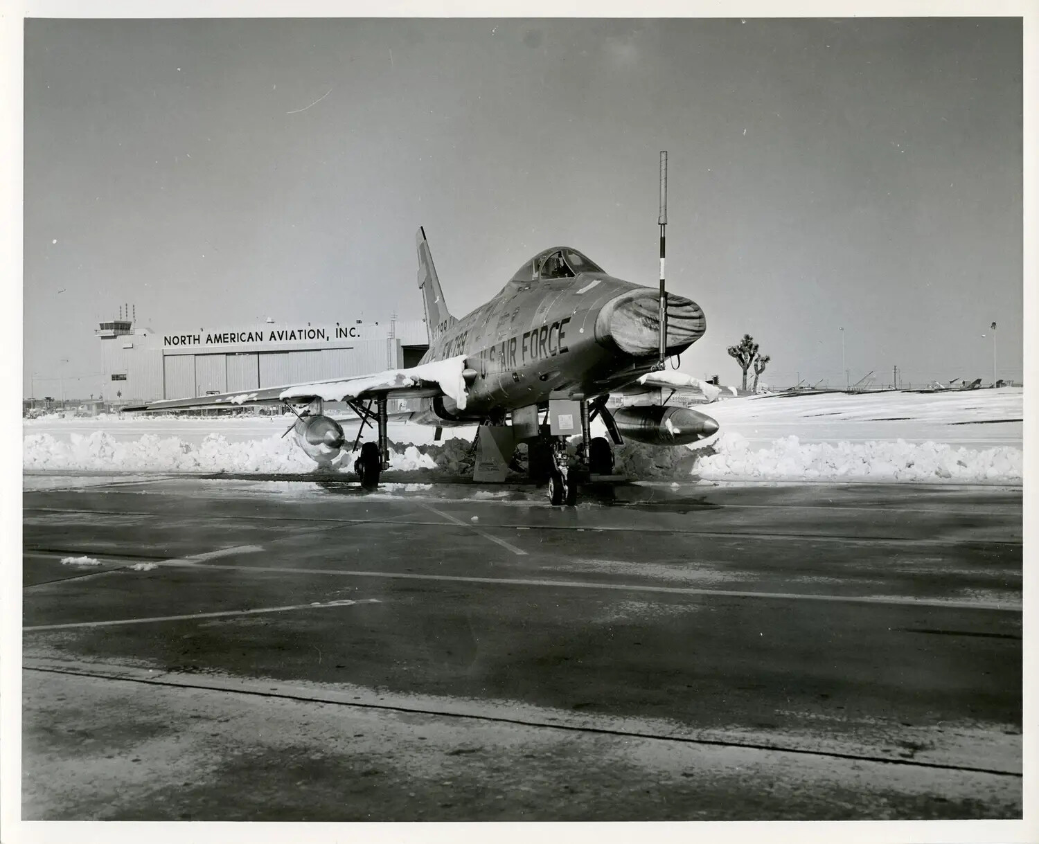 North American F-100 Super Sabre on Snow-Covered Ramp at North American Aviation Plant