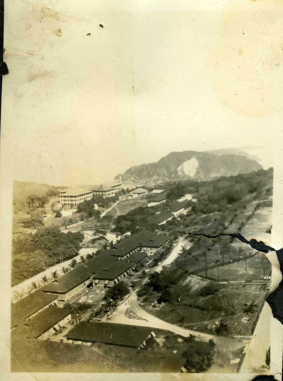 Elevated View of Barracks-Style Buildings on a Coastal Hillside, Manila Bay Area, Early-Mid 20th Century
