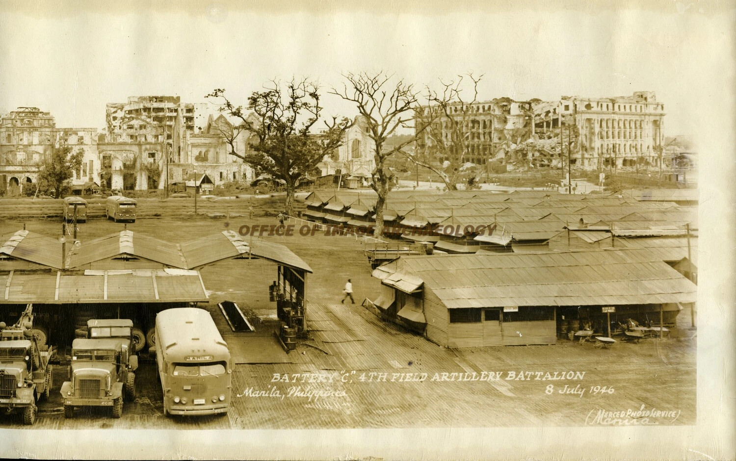 Battery 'C,' 4th Field Artillery Battalion Camp with Ruined Manila Skyline, 8 July 1946