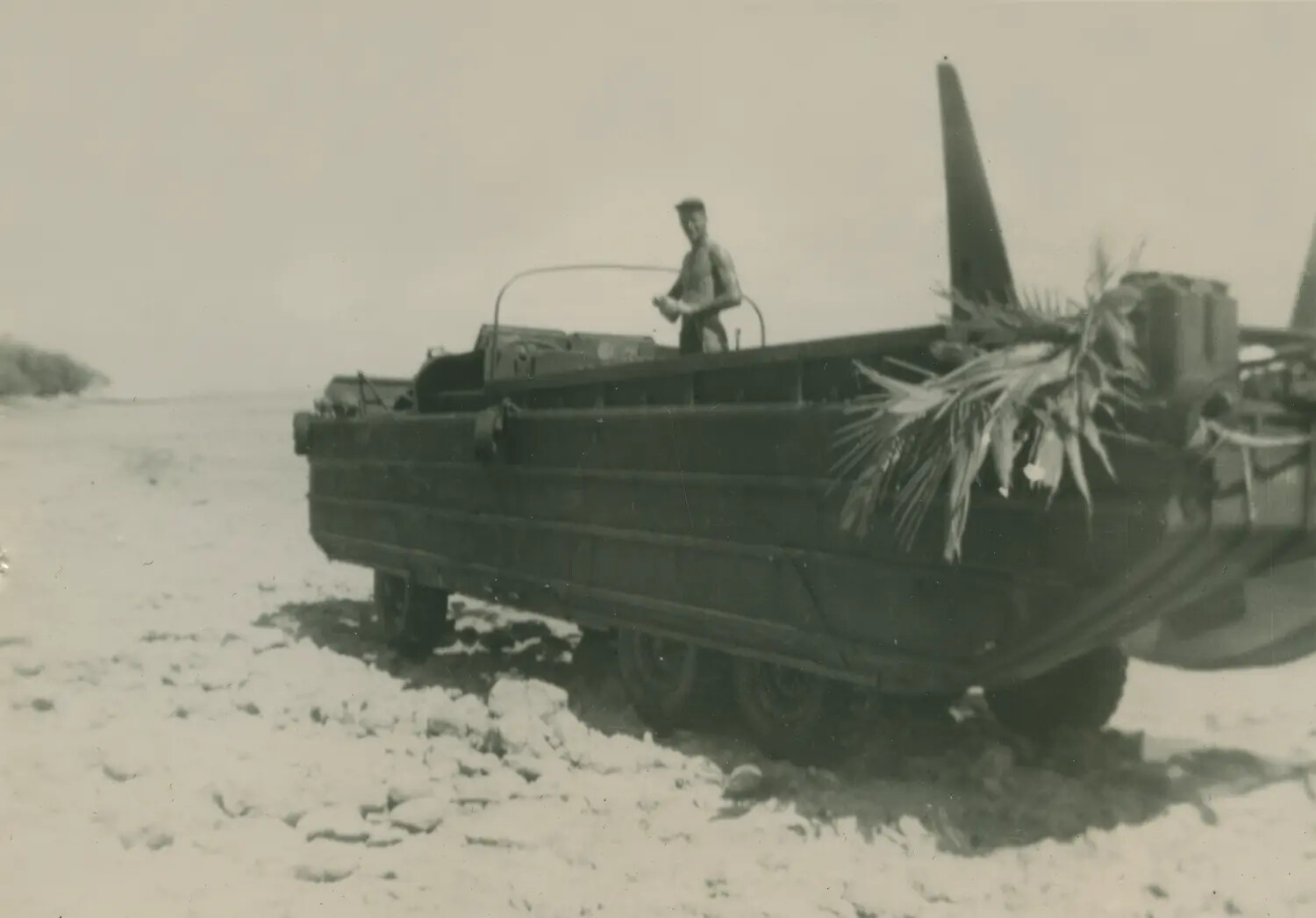 DUKW Amphibious Truck Hauling Aircraft Wreckage, Pacific Island Beach