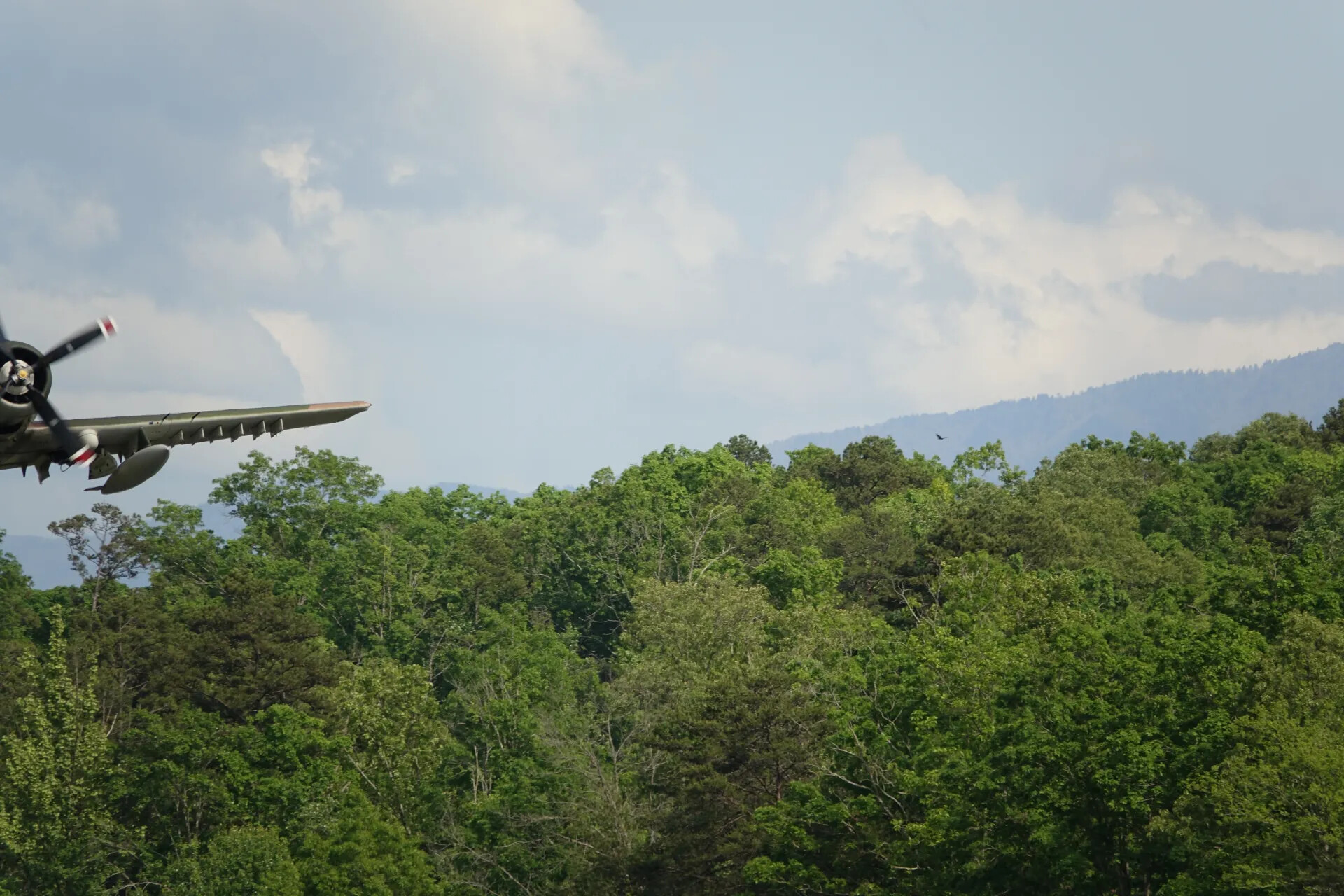 Warbird Aircraft Wing and Engine in Flight Over Tennessee Treeline, May 2019 Airshow Event