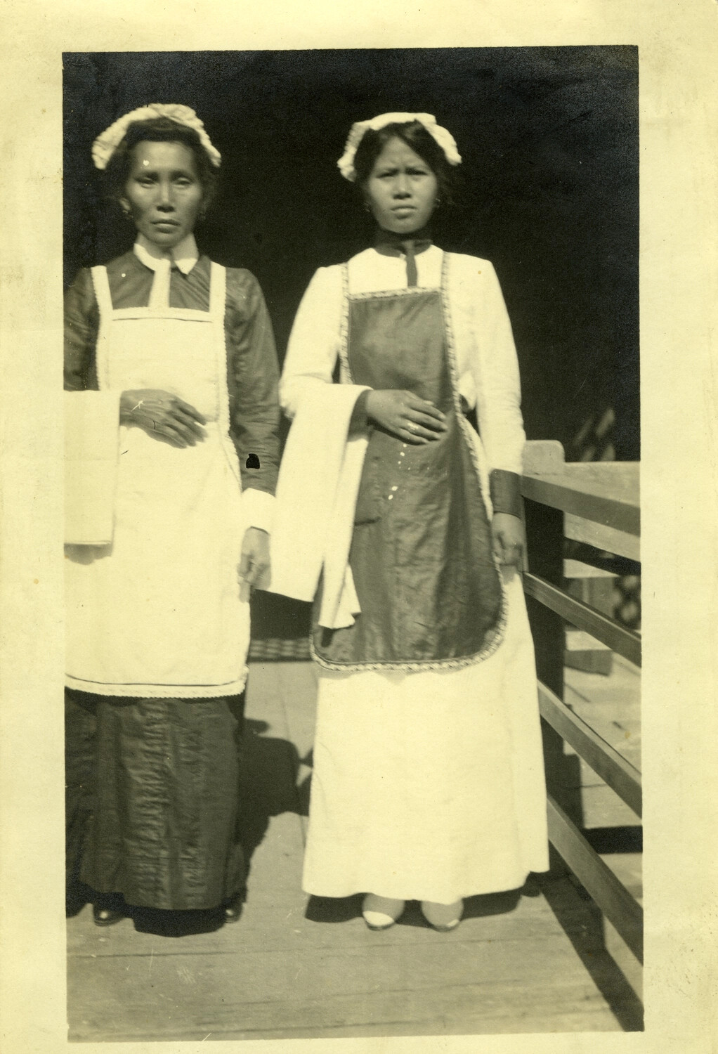 Portrait of Two Filipina Domestic Staff in Uniform, Philippines, Early 1900s