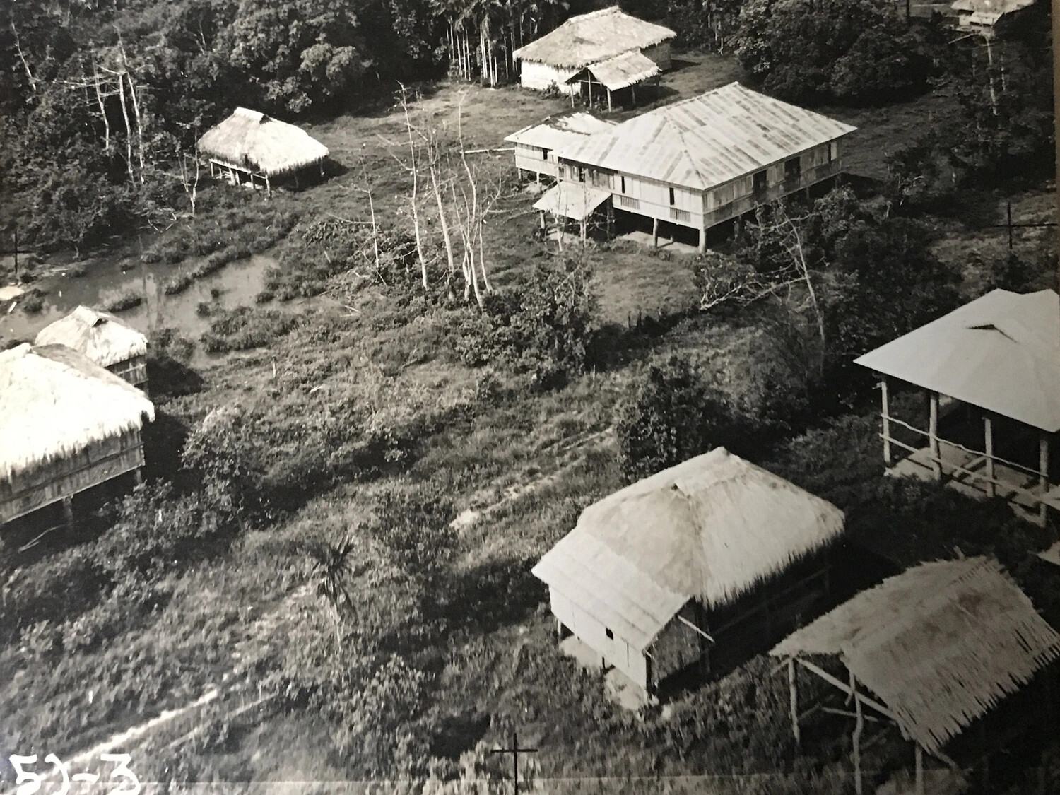 Strike Photograph of Village Structures, Jones Town, Isabela, Luzon, Philippines, 389th Bomb Squadron, 312th Bomb Group, Frame (5)-3, 20 May 1945