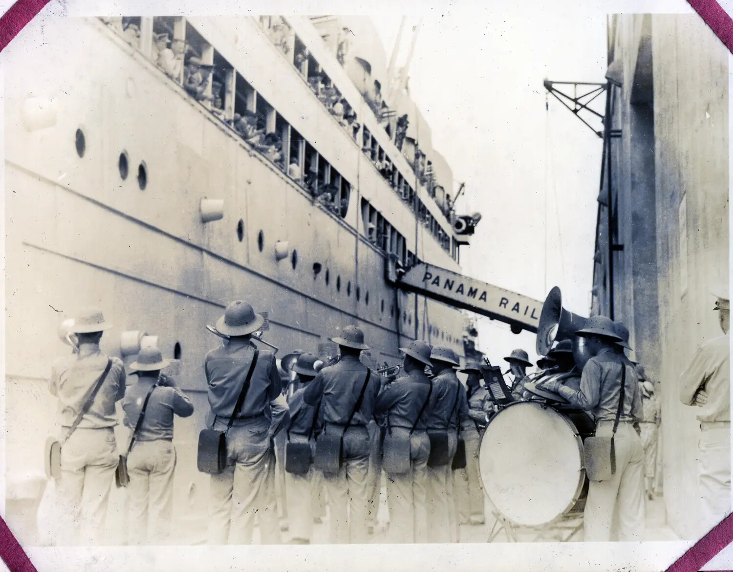 U.S. Army Band Welcomes Arriving Steamship at Panama Canal Zone Dock, WWII Era