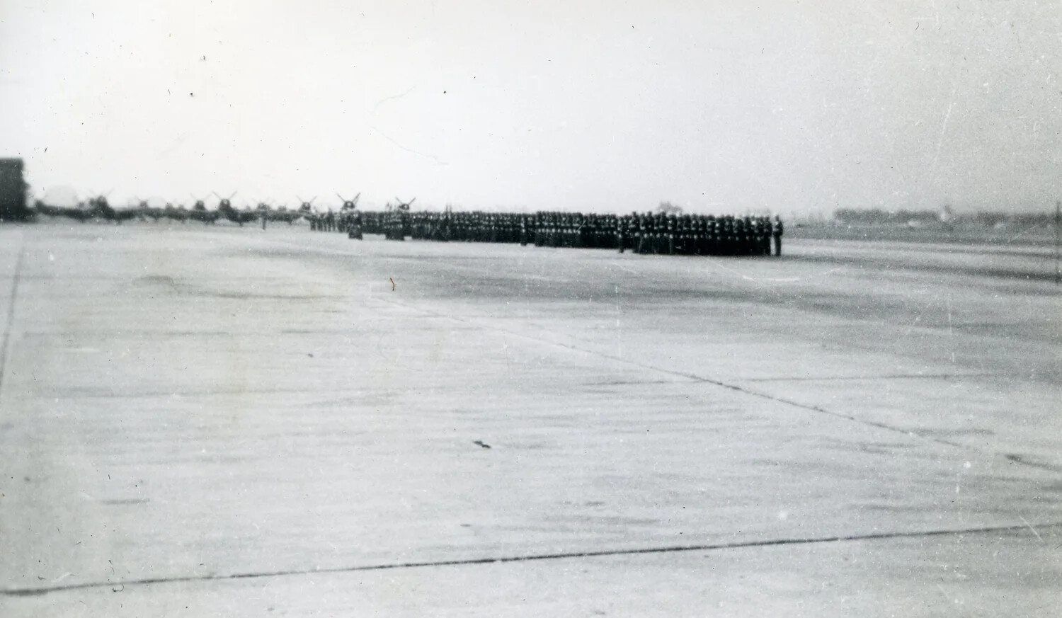 Marine Fighter Squadron Personnel in Formation on Flight Line, VMF-214 Album, 1945