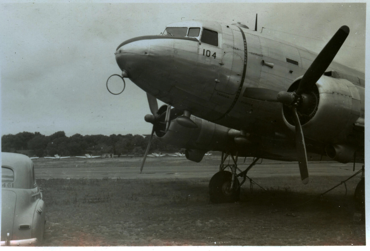 Douglas Twin-Engine Transport Aircraft No. 104, Airfield Ramp, Lt. Bancroft Korean War Collection