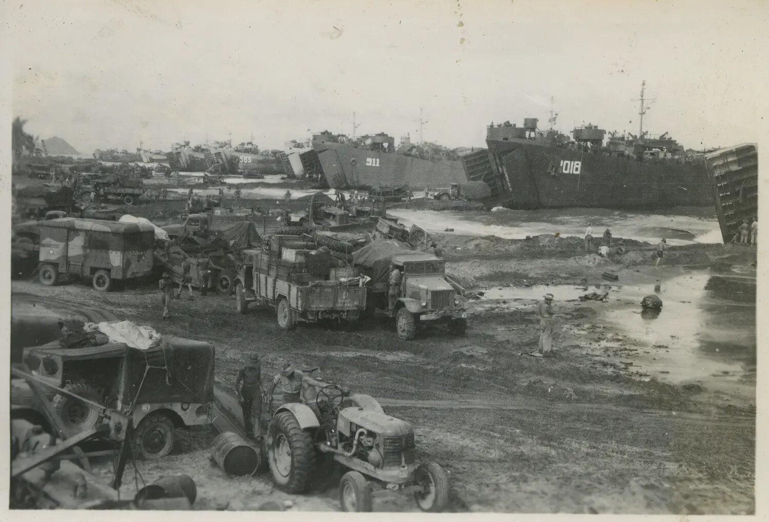 LSTs Beached at Landing Site with Army Trucks and Equipment, Philippines Campaign