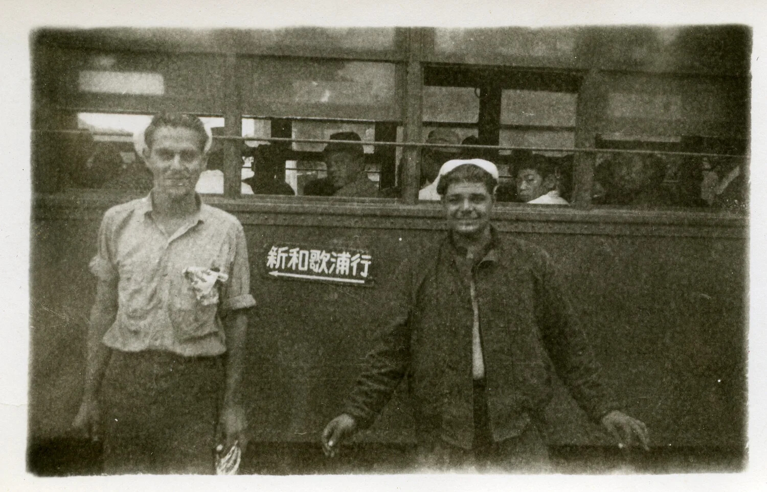 American Servicemen with Japanese Streetcar Bound for Shin-Wakaura