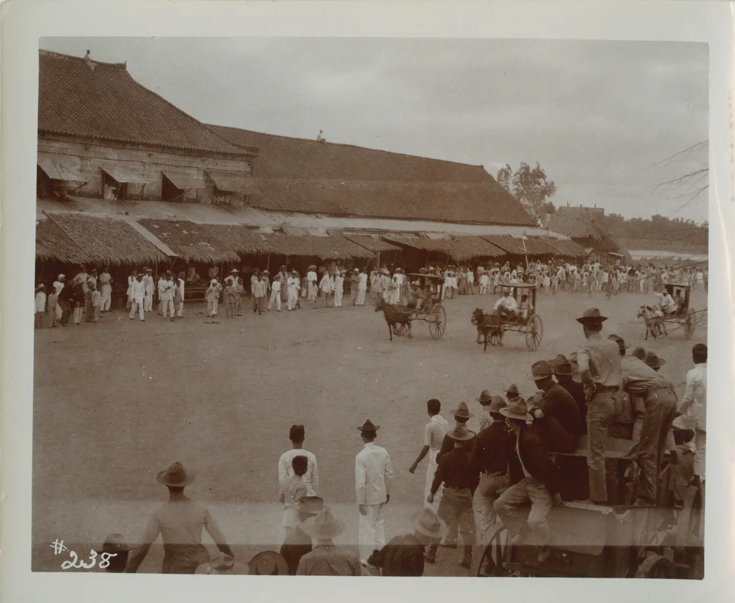 Market Street Scene with Filipino Crowds and American Soldiers, Philippines, Early 1900s