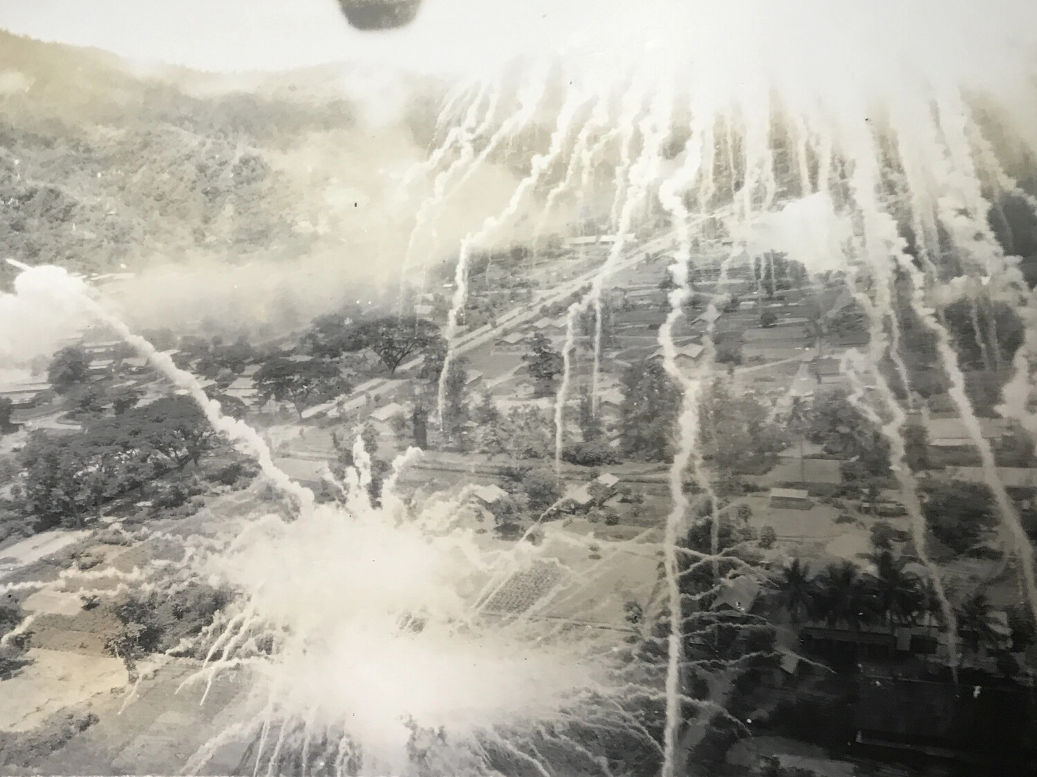 Low-Level Bombing Attack on a Pacific Village, 312th Bomb Group Combat Photograph