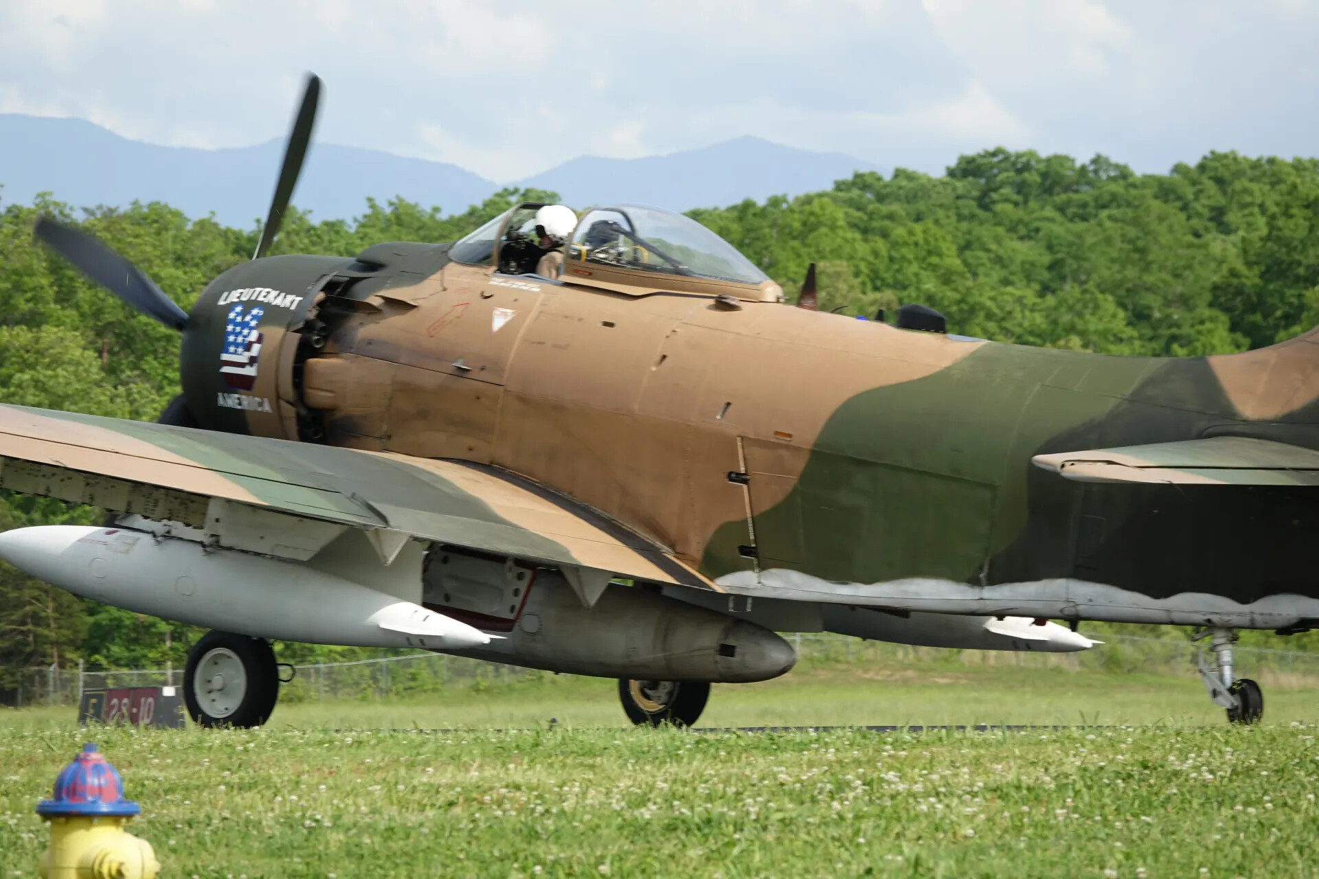 A-1 Skyraider 'Lieutenant America' Taxiing at Air Show, Close-Up View