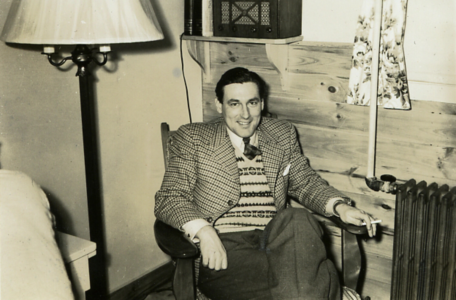 Portrait of a Man in Tweed Jacket Smoking in a Domestic Living Room, Postwar Era