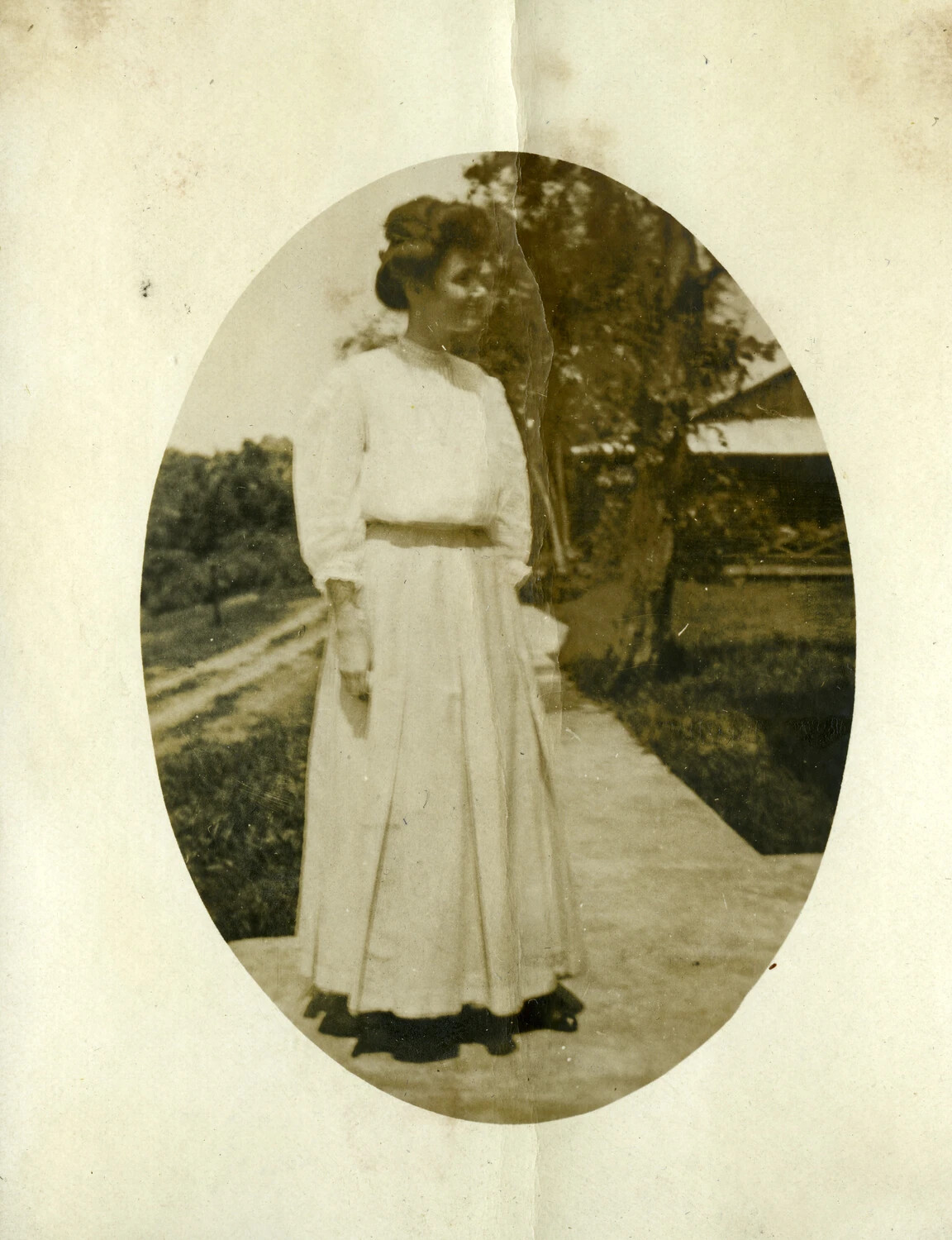 Oval Portrait of a Woman in Edwardian Dress, Carl Stone Philippines Album, Early 1900s